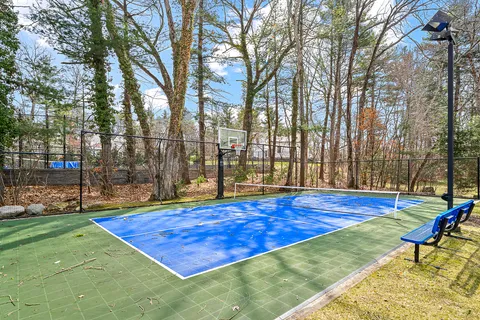 a view of swimming pool with patio