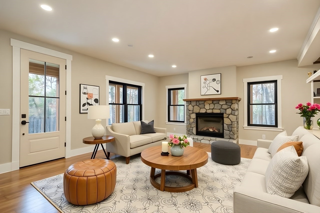 171 Randall Road Berlin, MA 01503 - Photo 5 of 41 a living room with furniture and a fireplace