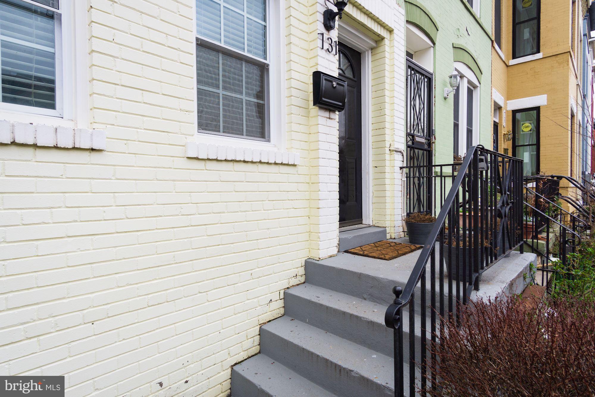 731 13th Street Northeast Washington, DC 20002 - Photo 2 of 43 a view of a house with stairs and wooden floor