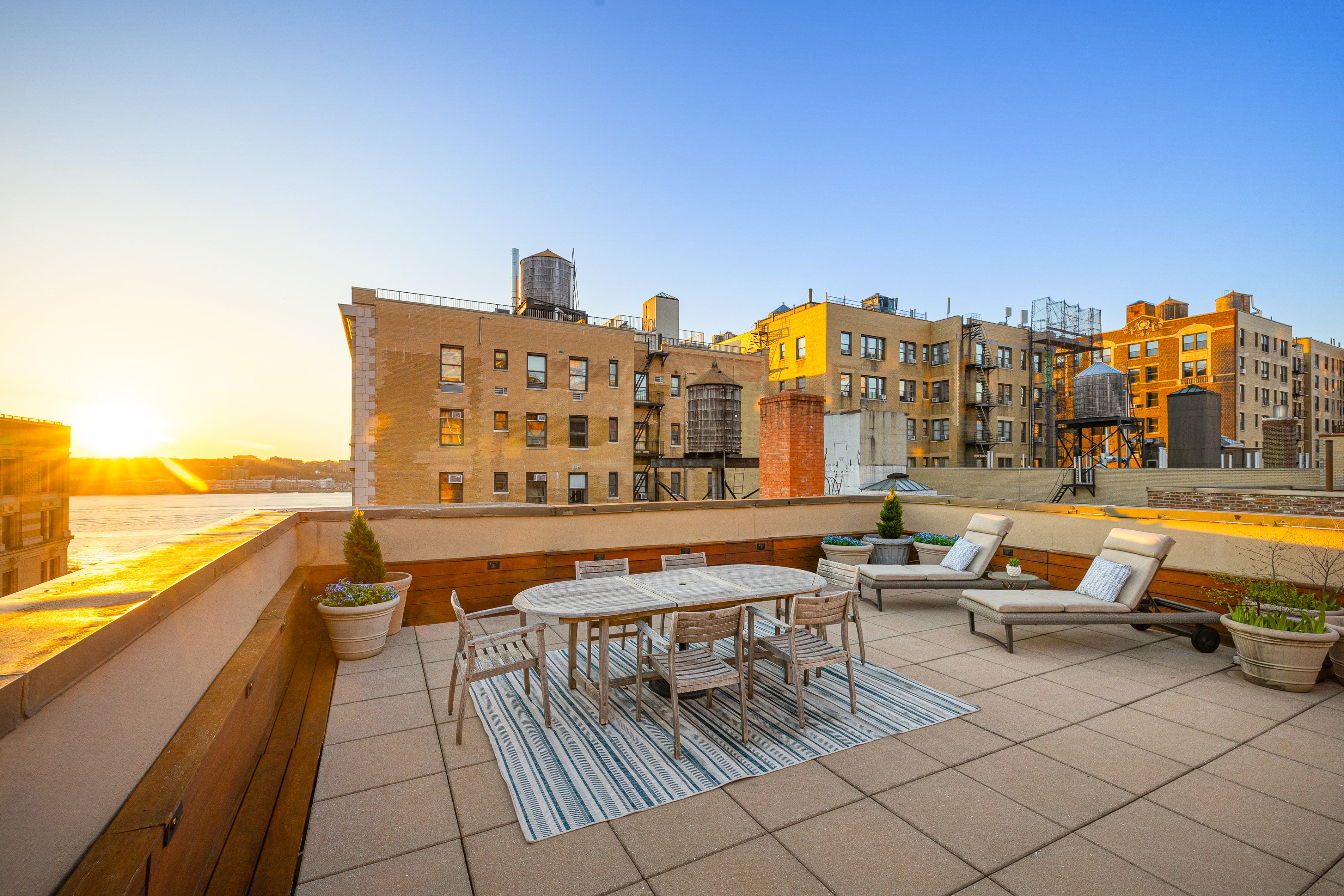 315 West 99th Street, Unit PHA Manhattan, NY 10025 - Photo 1 of 17 a terrace with outdoor seating and city view