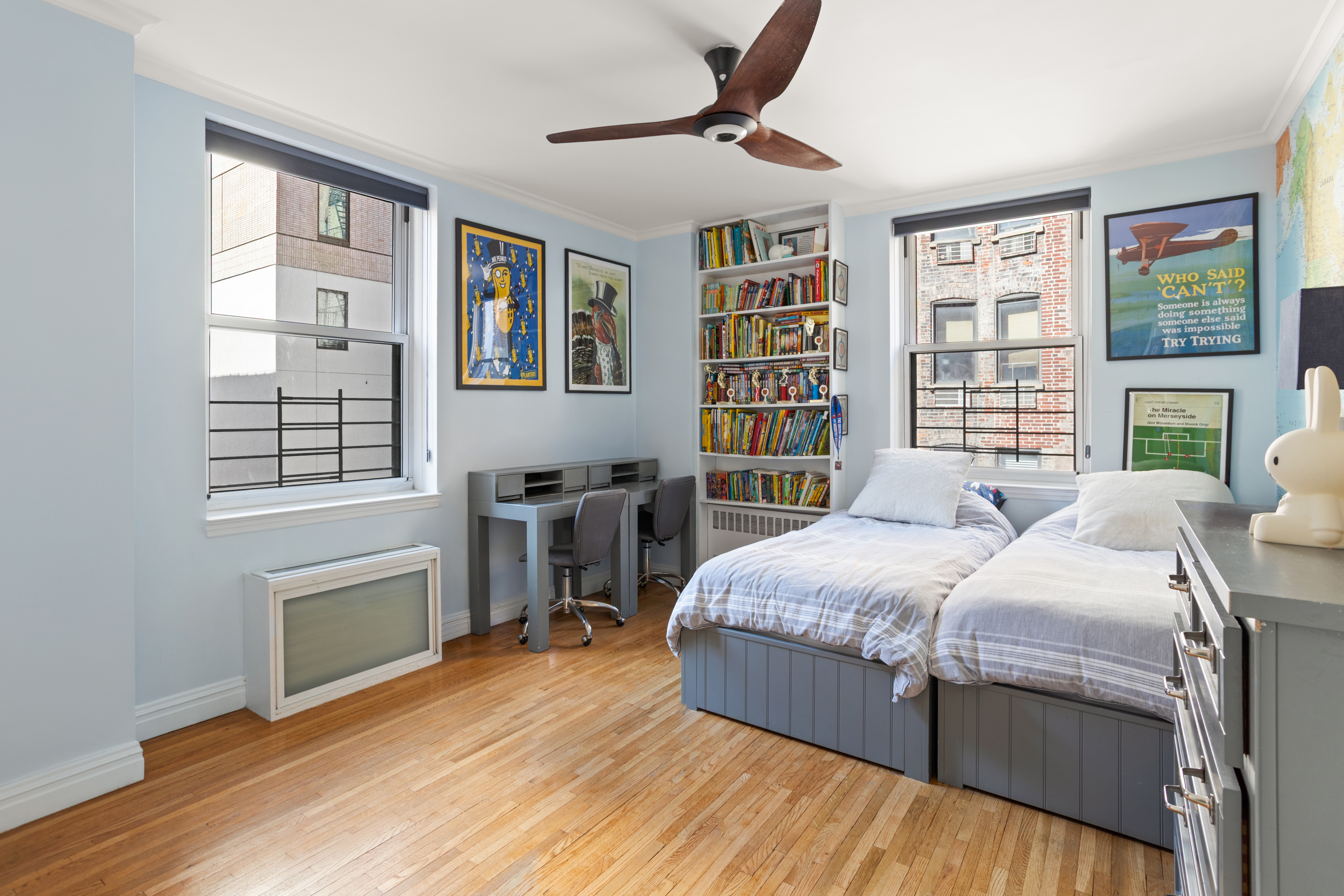 161 East 90th Street, Unit 5C Manhattan, NY 10128 - Photo 9 of 14 a bedroom with a bed furniture and a window