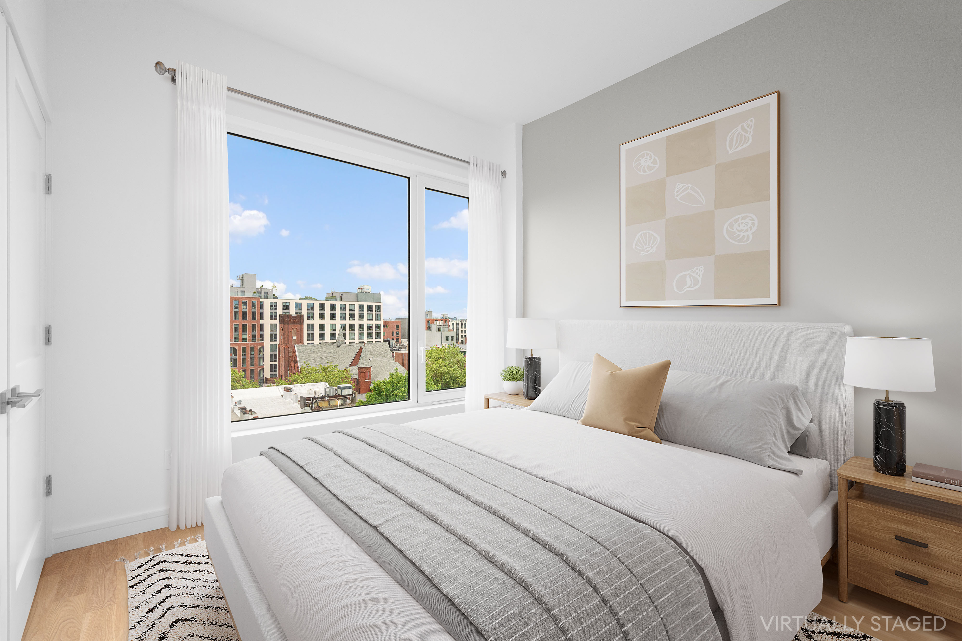 927 Atlantic Avenue, Unit 7A Brooklyn, NY 11238 - Photo 5 of 16 a bedroom with a bed and a large window