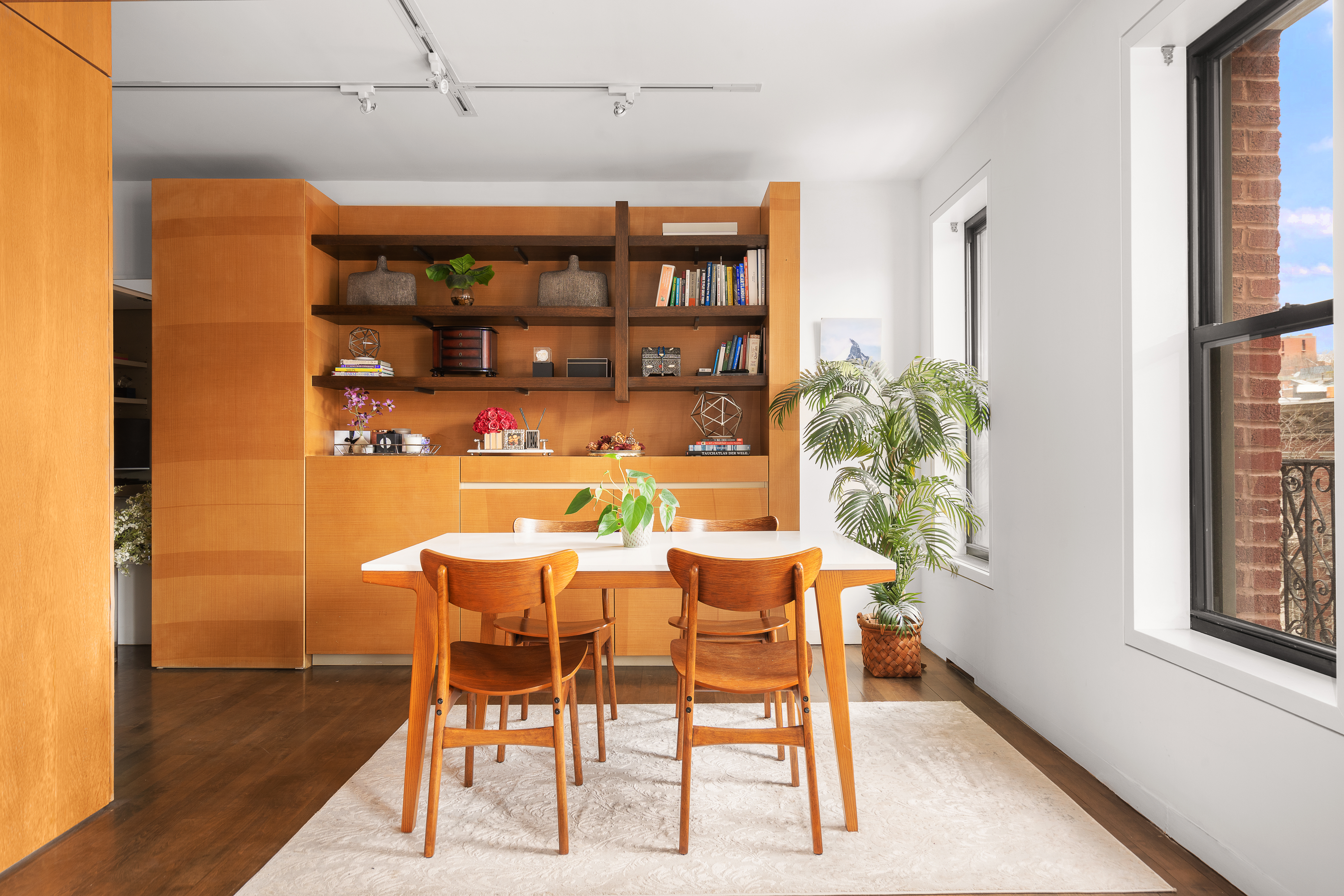 340 West 19th Street, Unit 14 Manhattan, NY 10011 - Photo 5 of 12 a dining room with furniture and a window