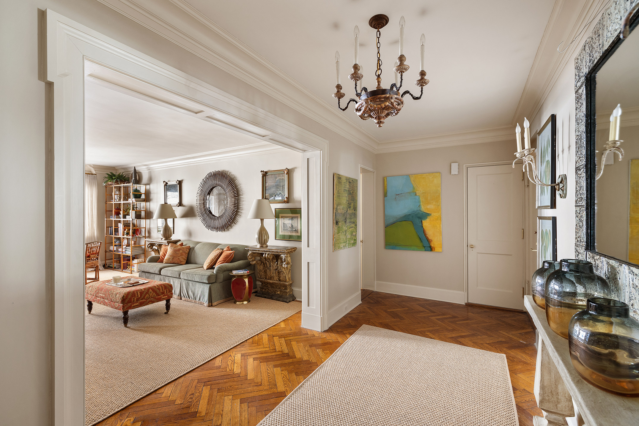 710 Park Avenue, Unit 4D Manhattan, NY 10021 - Photo 6 of 13 a very nice looking room with a large window and chandelier