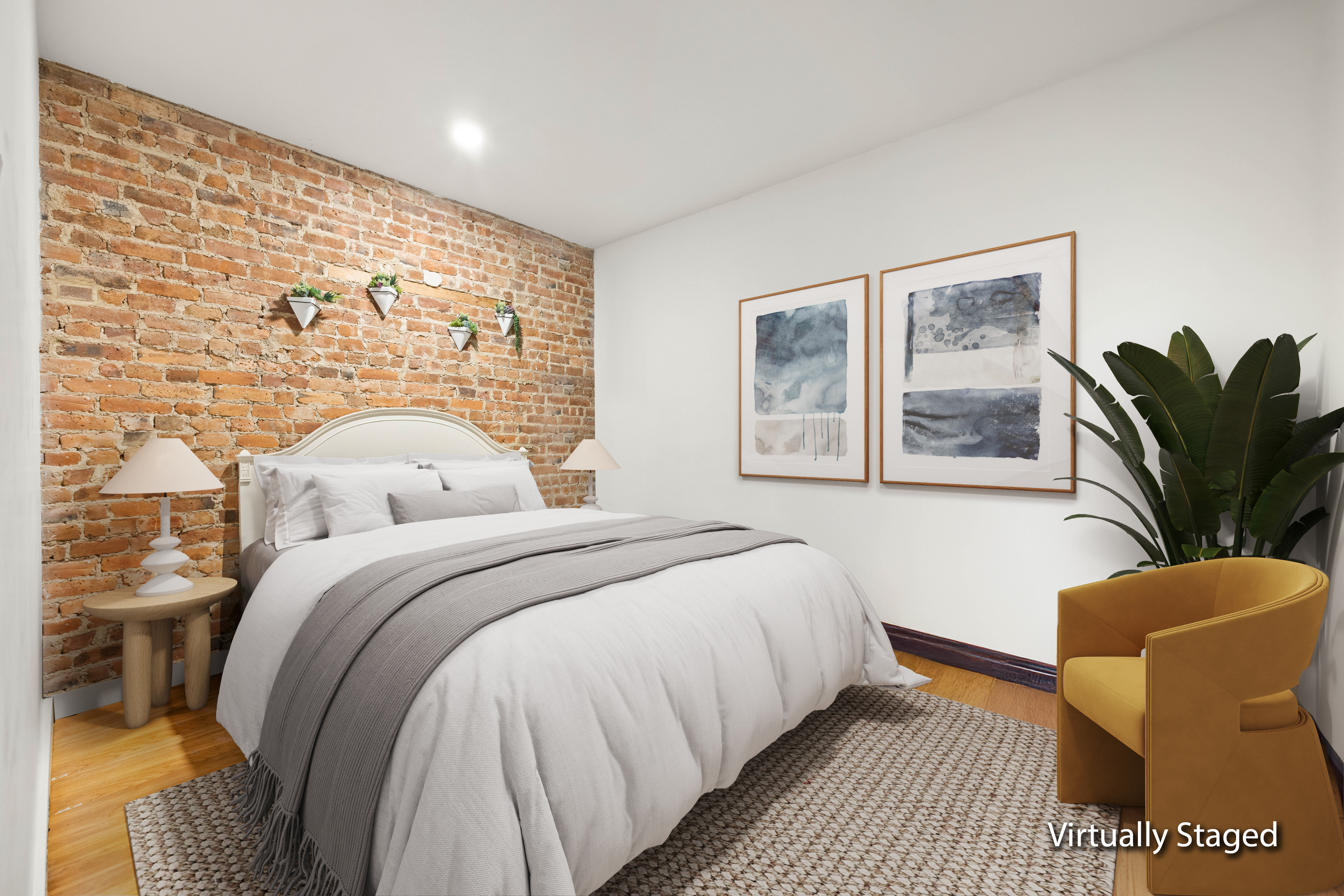 750 Lincoln Place Brooklyn, NY 11216 - Photo 22 of 24 a bedroom with a bed and wooden floor