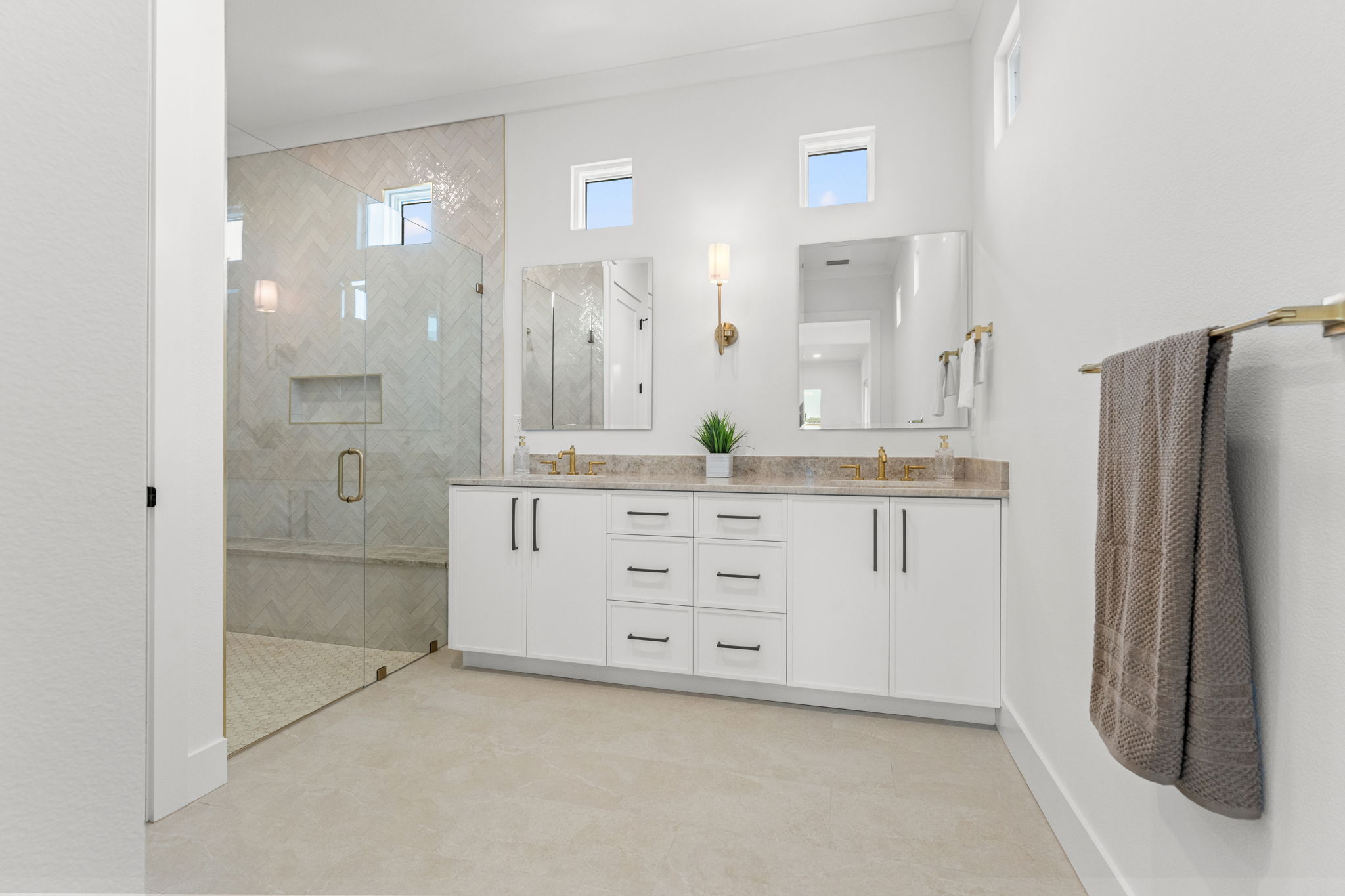 500 East Davis Boulevard Tampa, FL 33606 - Photo 19 of 36 a bathroom with a double vanity sink mirror and shower