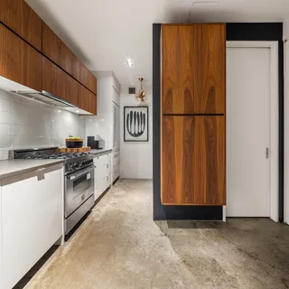 a room with a table and chairs