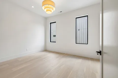 a bathroom with a shower and a bath tub