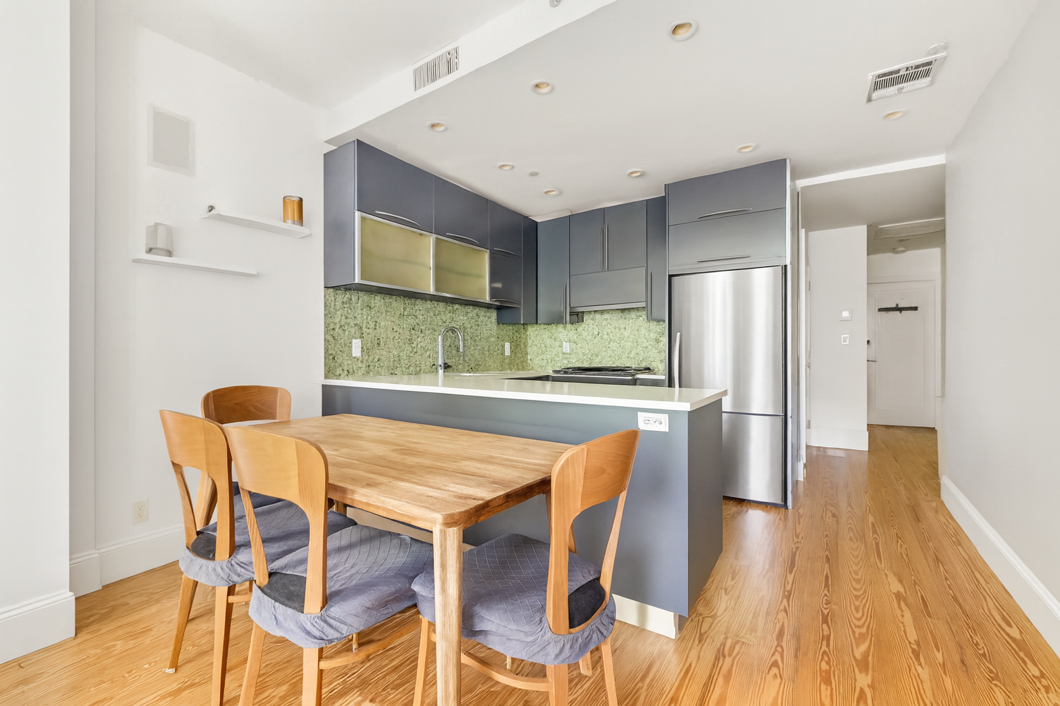 667 Carroll Street, Unit 2 Brooklyn, NY 11215 - Photo 3 of 7 a dining room with furniture and wooden floor