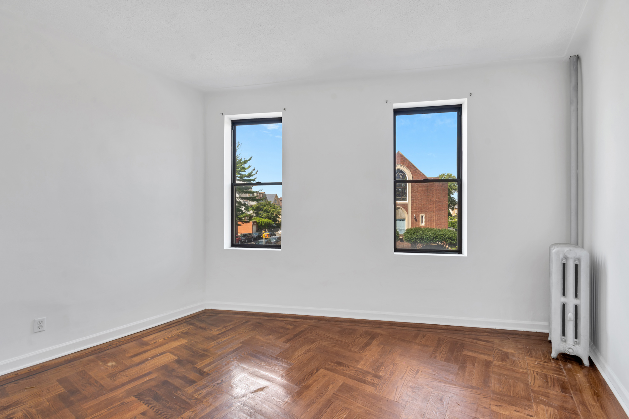 7609 4th Avenue, Unit B1 Brooklyn, NY 11209 - Photo 7 of 17 a view of an empty room with a window