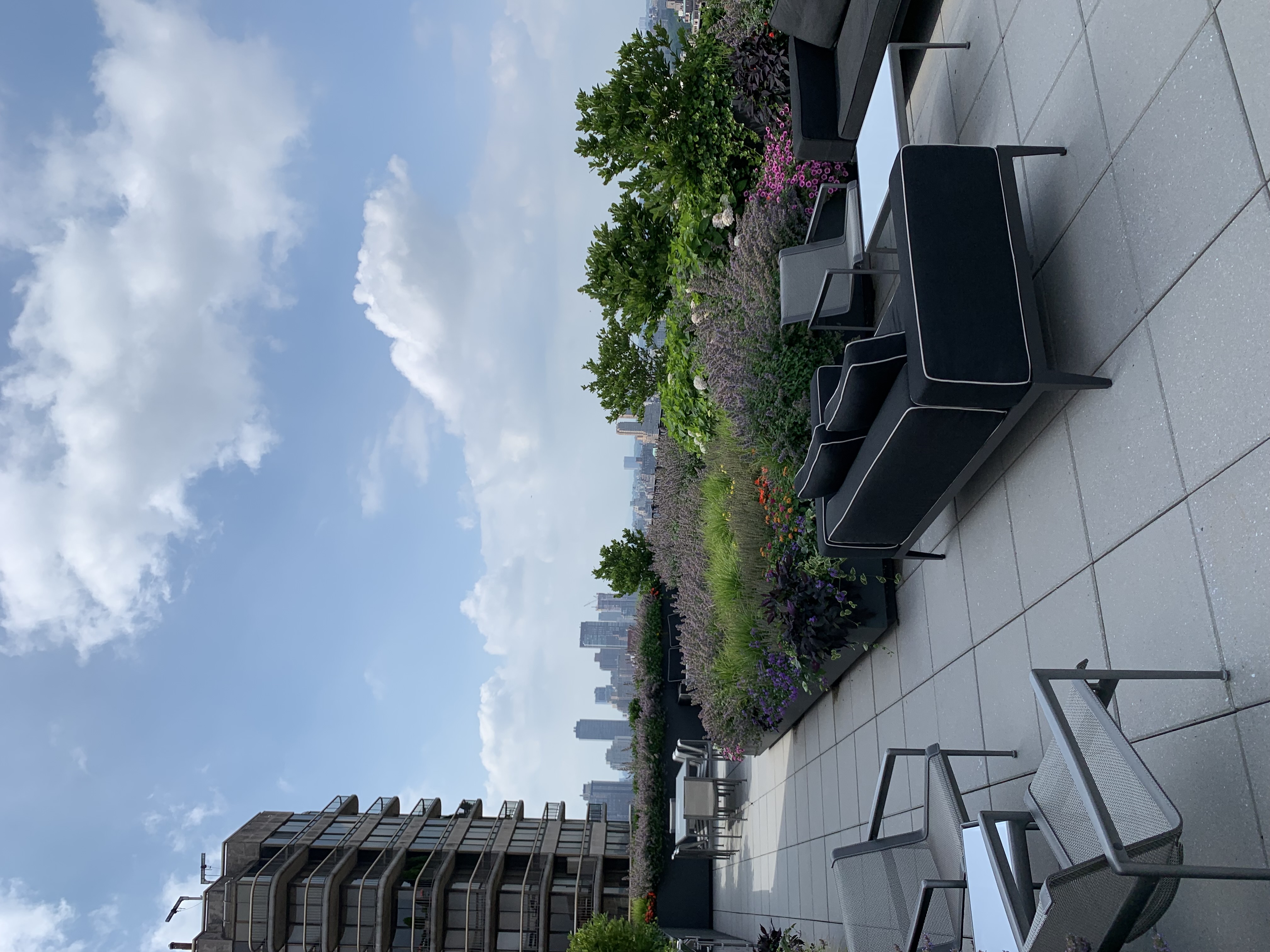 200 East 62nd Street, Unit 5A Manhattan, NY 10065 - Photo 20 of 25 a view of a terrace with outdoor seating and trees