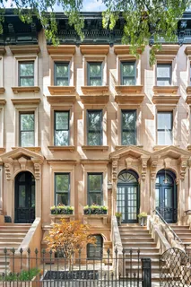 a front view of a building with many windows