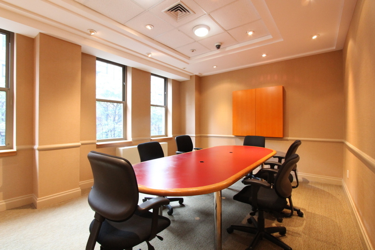400 East 90th Street, Unit 7E Manhattan, NY 10128 - Photo 10 of 12 a view of a dining room with furniture and a window