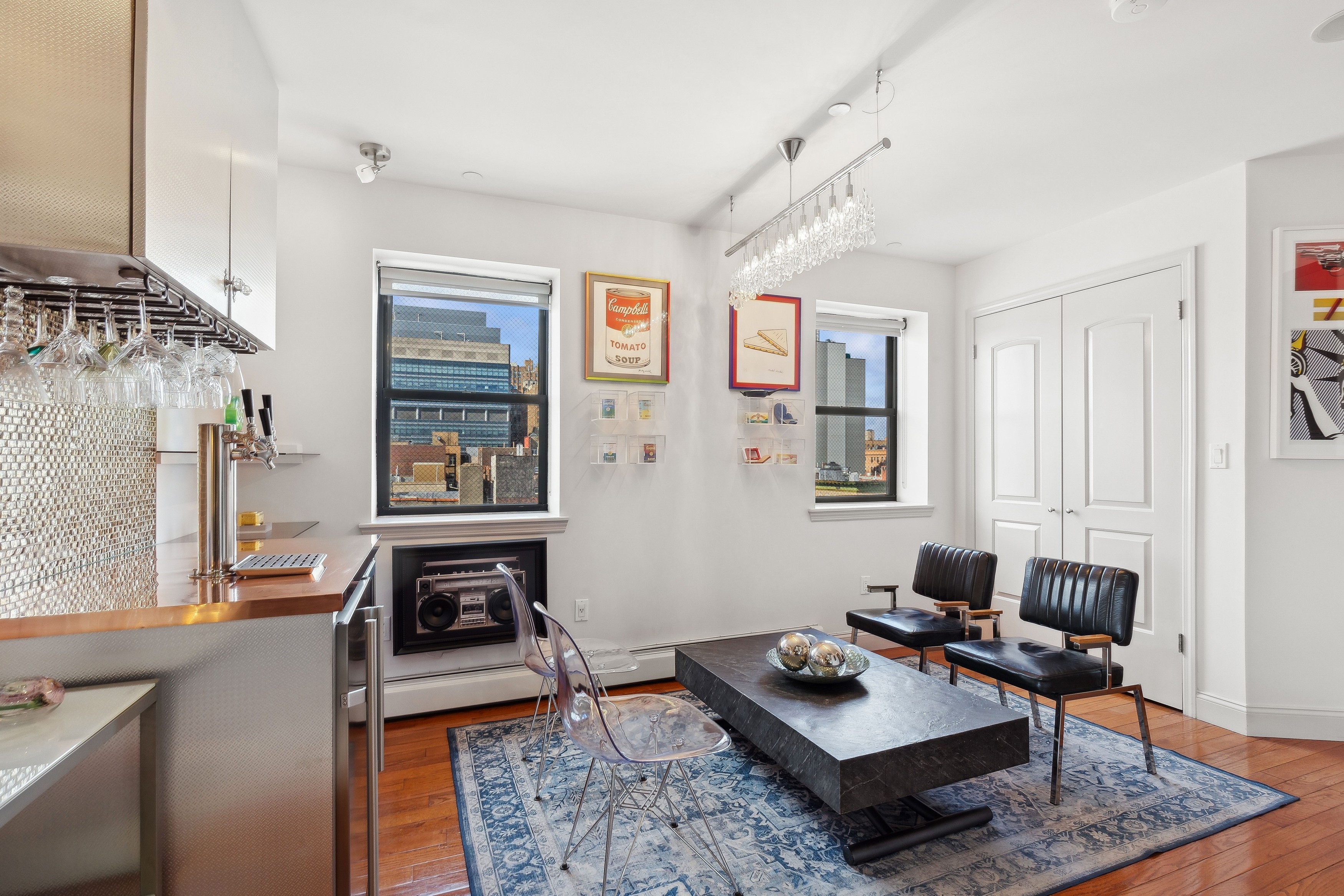 456 West 167th Street, Unit 7C Manhattan, NY 10032 - Photo 5 of 16 a living room with furniture and a table