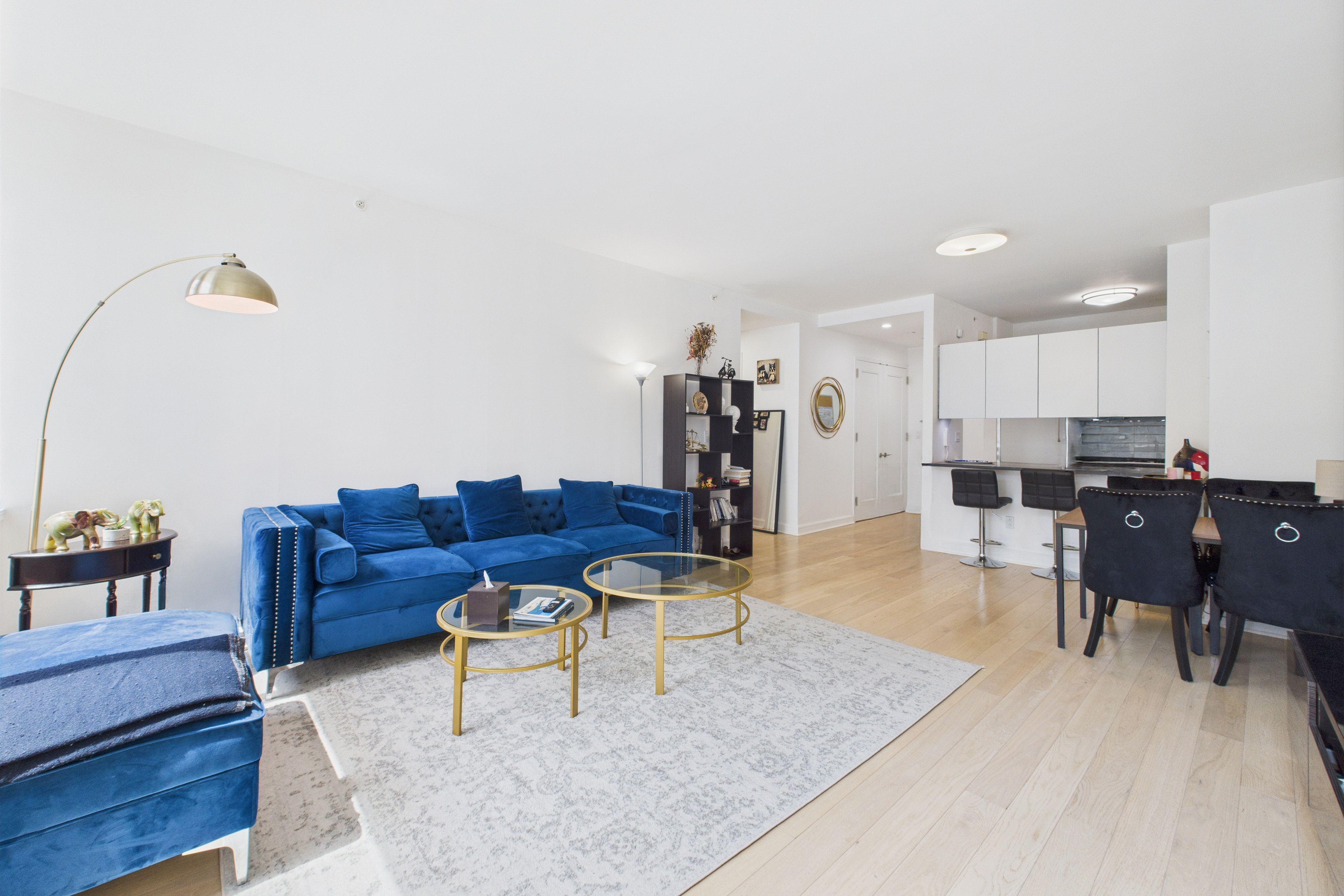100 Riverside Boulevard, Unit 12B Manhattan, NY 10069 - Photo 3 of 10 a living room with furniture and a table