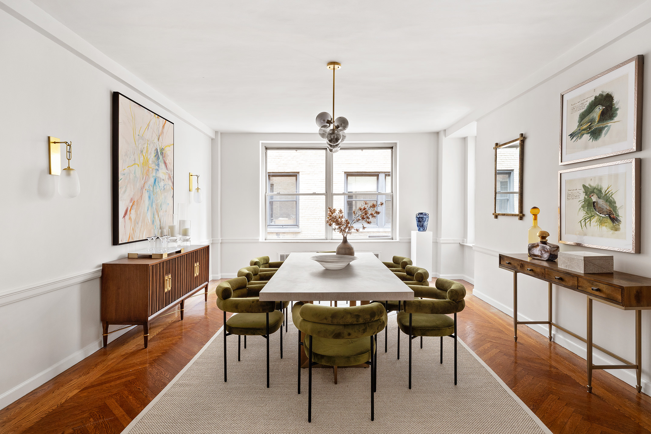 33 East 70th Street, Unit 9D Manhattan, NY 10021 - Photo 3 of 15 a dining room with furniture and window