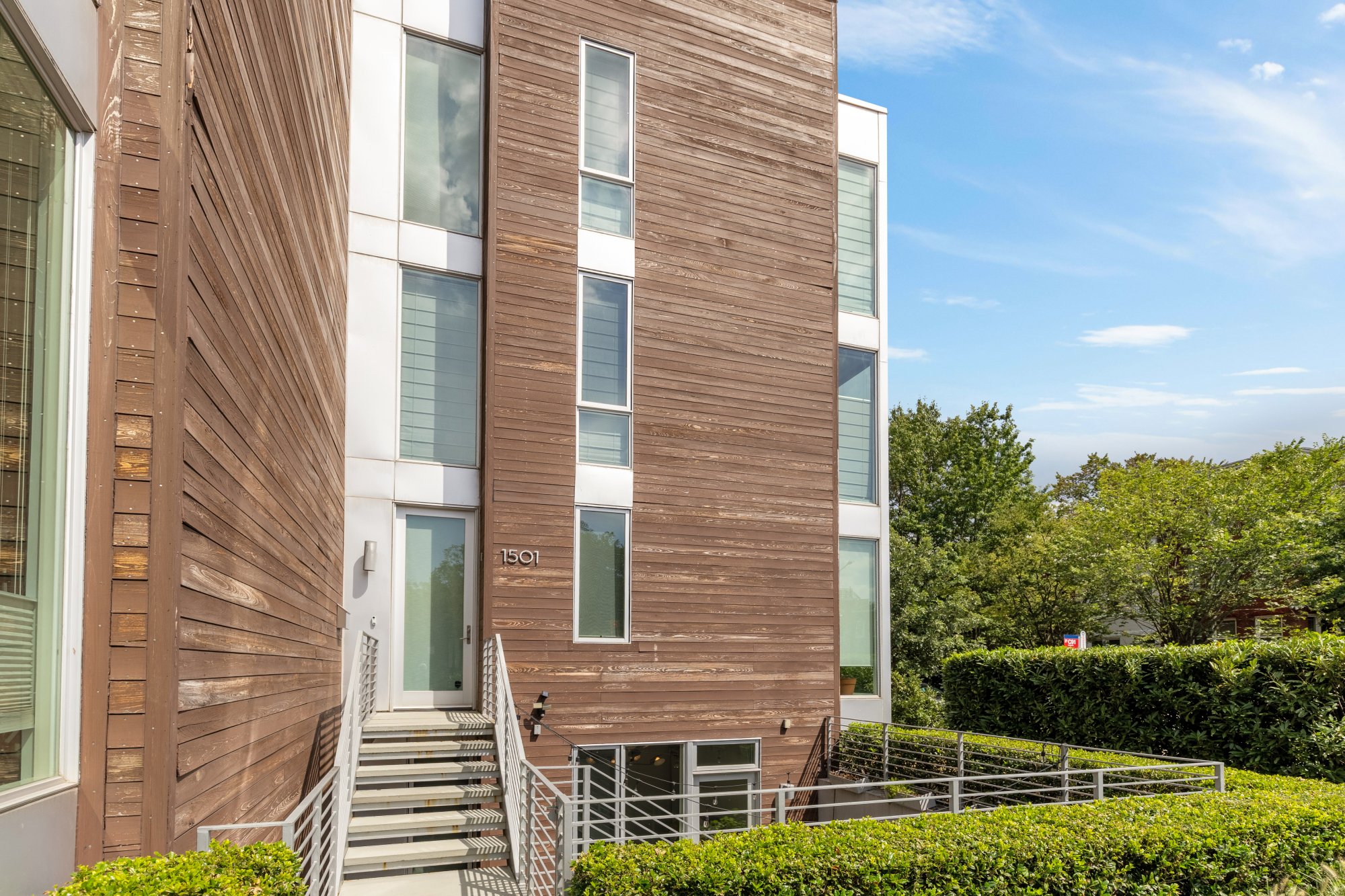 1501 4th Street Northwest, Unit 1 Washington, DC 20001 - Photo 2 of 41 a view of a brick building next to a yard