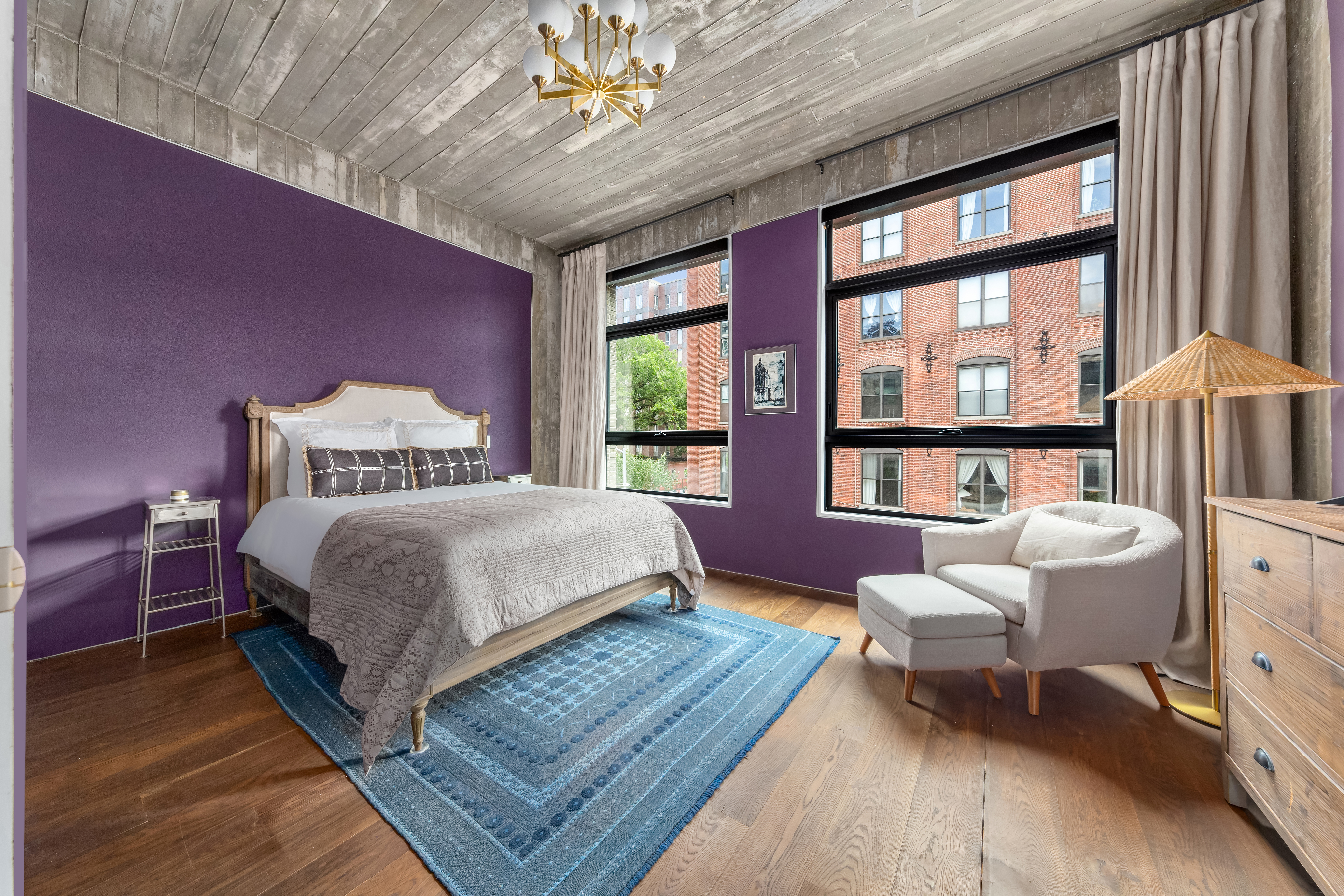 57 South 4th Street, Unit TH Brooklyn, NY 11249 - Photo 8 of 23 a spacious bedroom with a bed and a large window