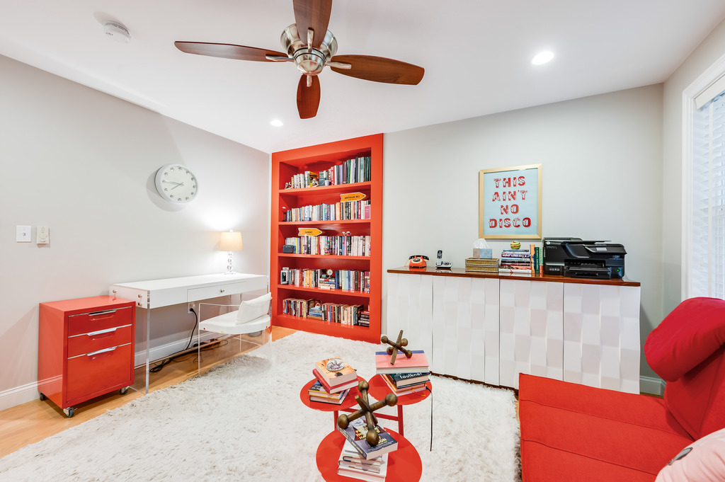 45 Washburn Avenue Needham, MA 02492 - Photo 15 of 23 a living room with furniture and gym equipment