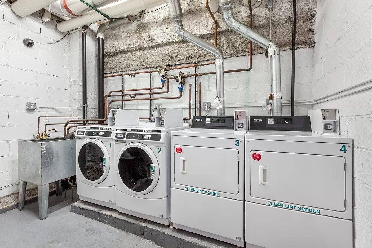 660 St Nicholas Avenue, Unit 54 Manhattan, NY 10030 - Photo 7 of 9 a utility room with dryer and washer