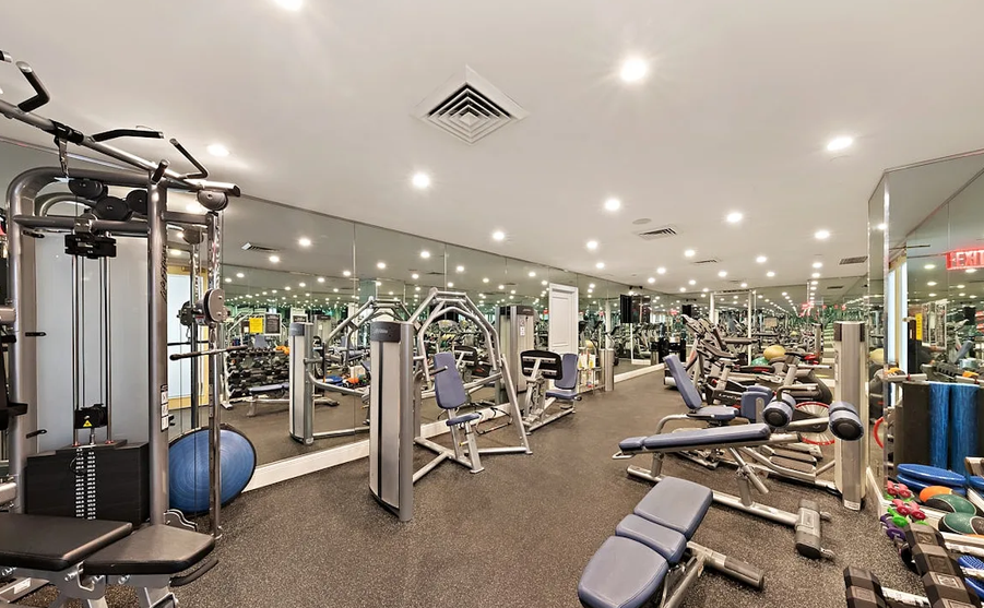351 East 51st Street, Unit L5C Manhattan, NY 10022 - Photo 12 of 18 a view of a room with gym equipment