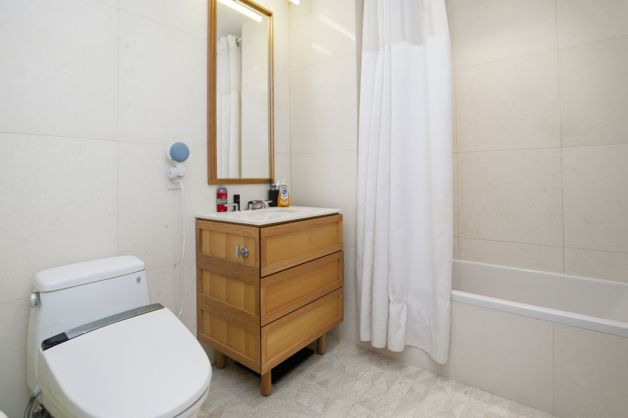 37-14 34th Street, Unit N3E Queens, NY 11101 - Photo 8 of 18 a bathroom with a sink toilet and shower