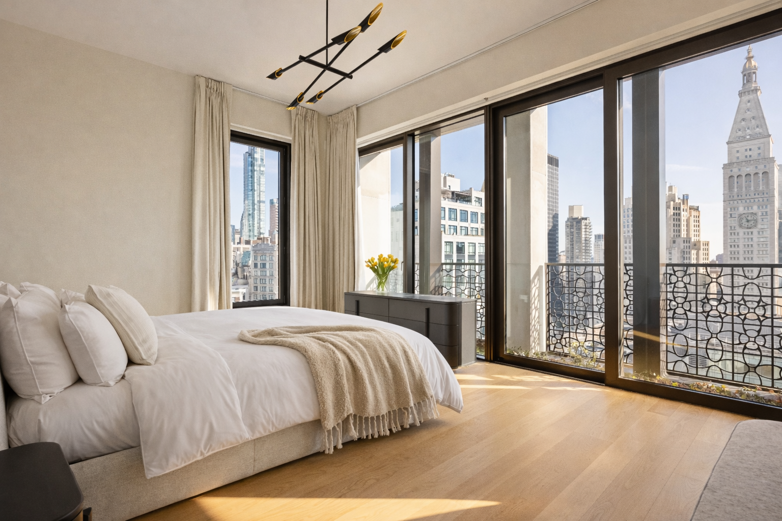 39 West 23rd Street, Unit PH Manhattan, NY 10010 - Photo 10 of 20 a bedroom with a large bed and a large window