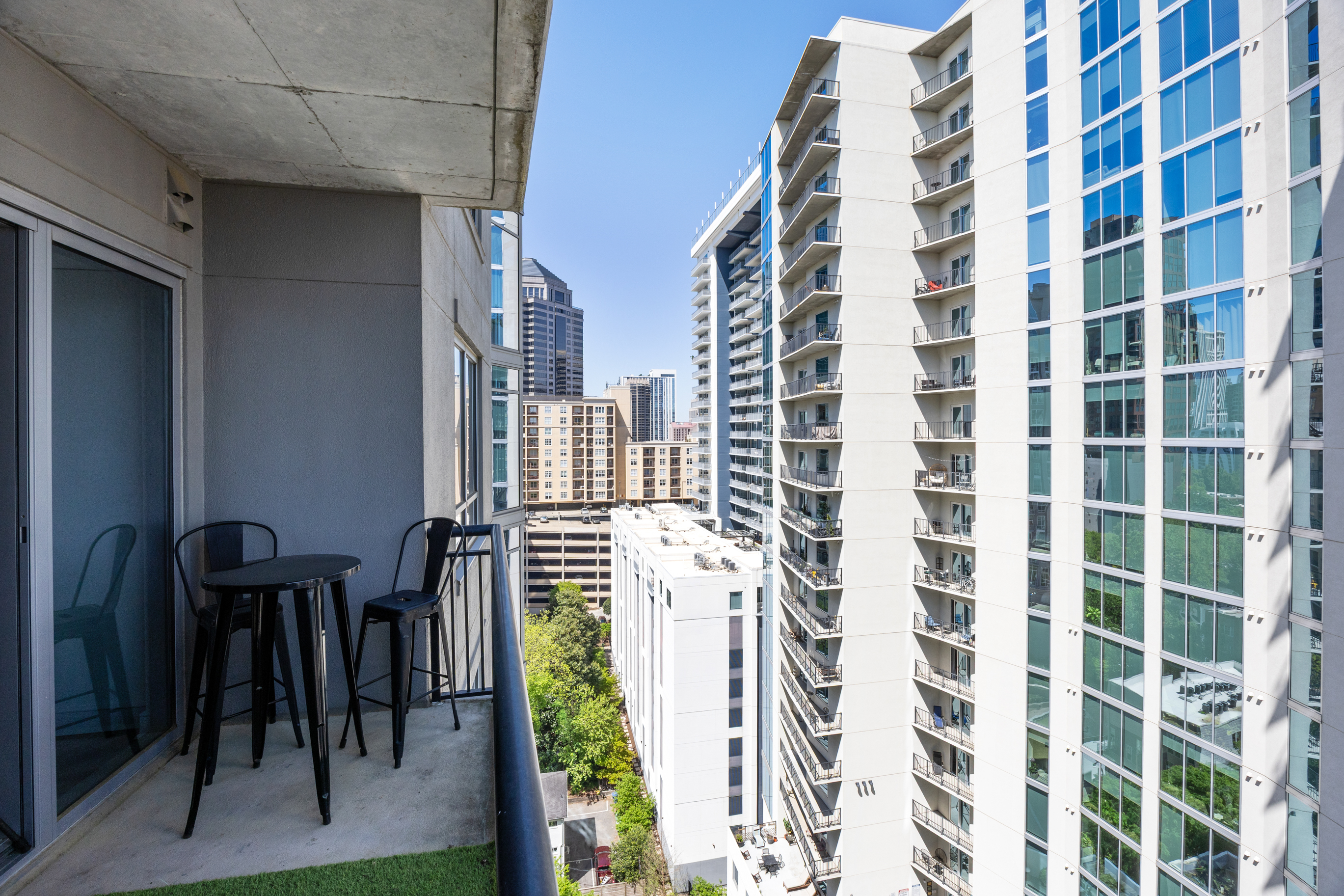 222 12th Street Northeast Atlanta, GA 30309 - Photo 26 of 56 a view of a balcony with chairs
