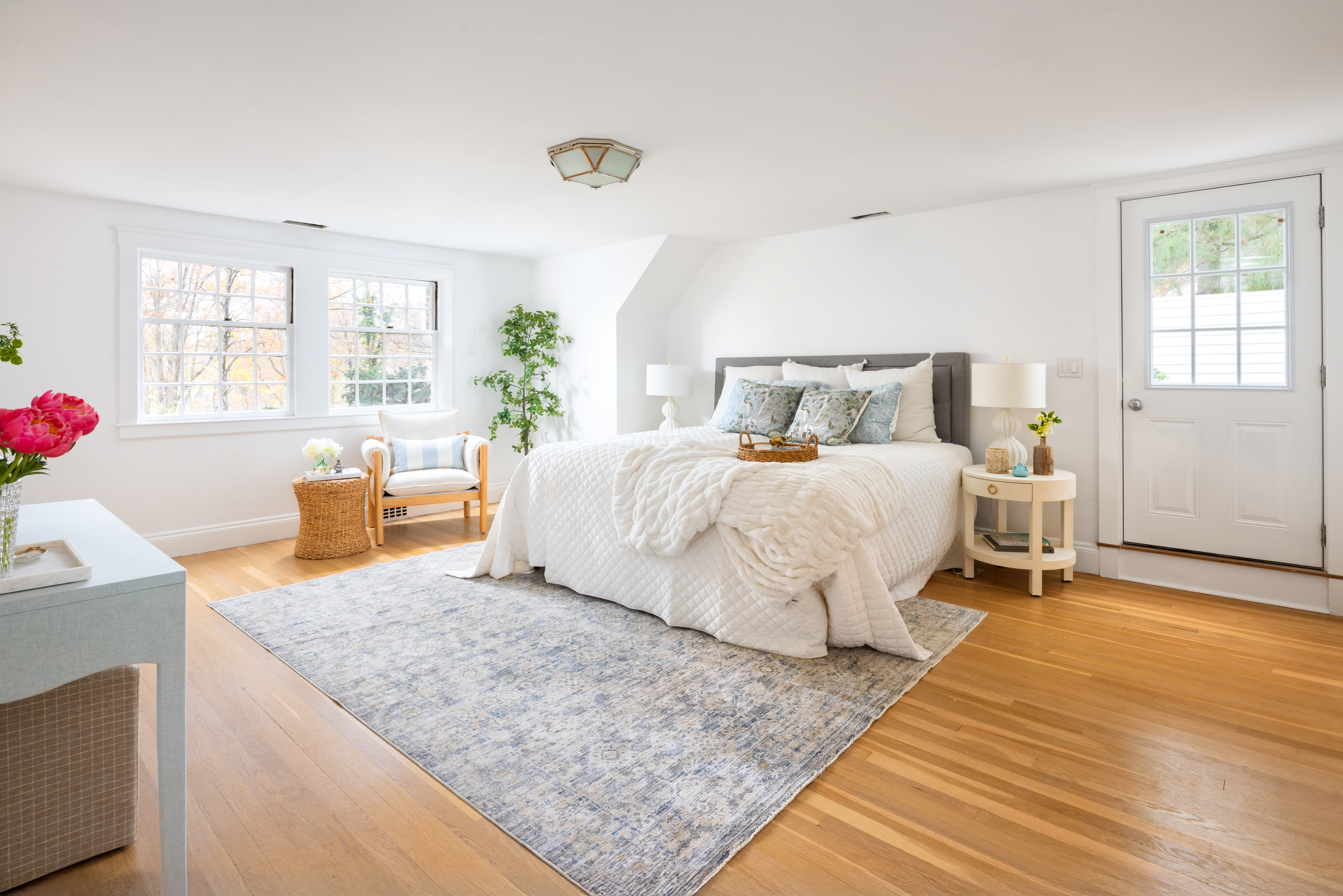 111 Beverly Road Brookline, MA 02467 - Photo 16 of 27 a bedroom with a bed and wooden floor