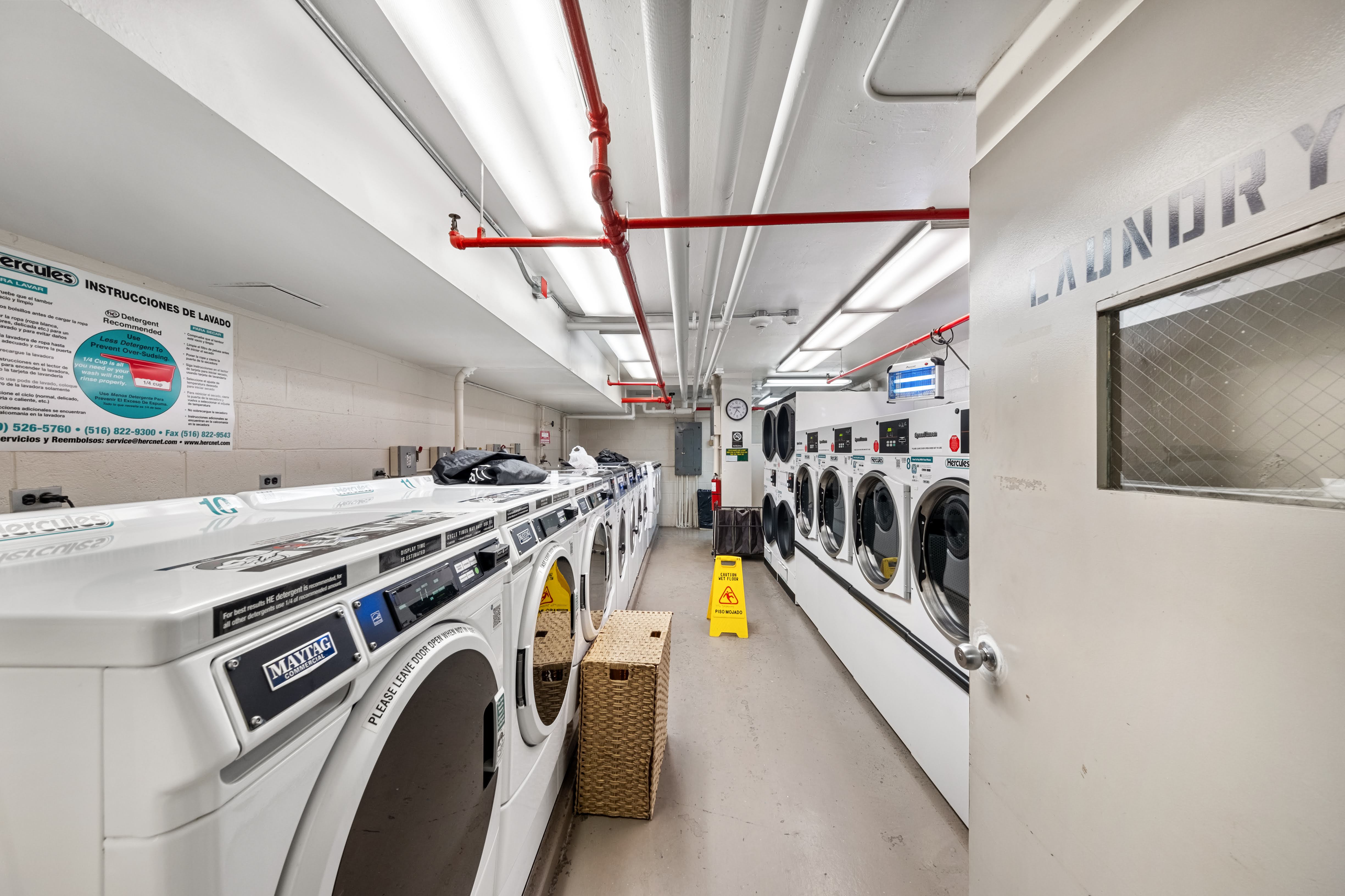 376 Broadway, Unit 4F Manhattan, NY 10013 - Photo 14 of 16 a utility room with dryer and washer