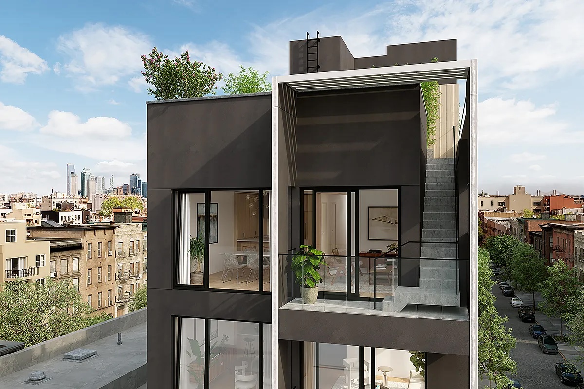 169 Huron Street, Unit 3A Brooklyn, NY 11222 - Photo 6 of 7 a front view of a house with outdoor seating and plants