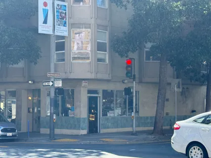 a view of a building and a street