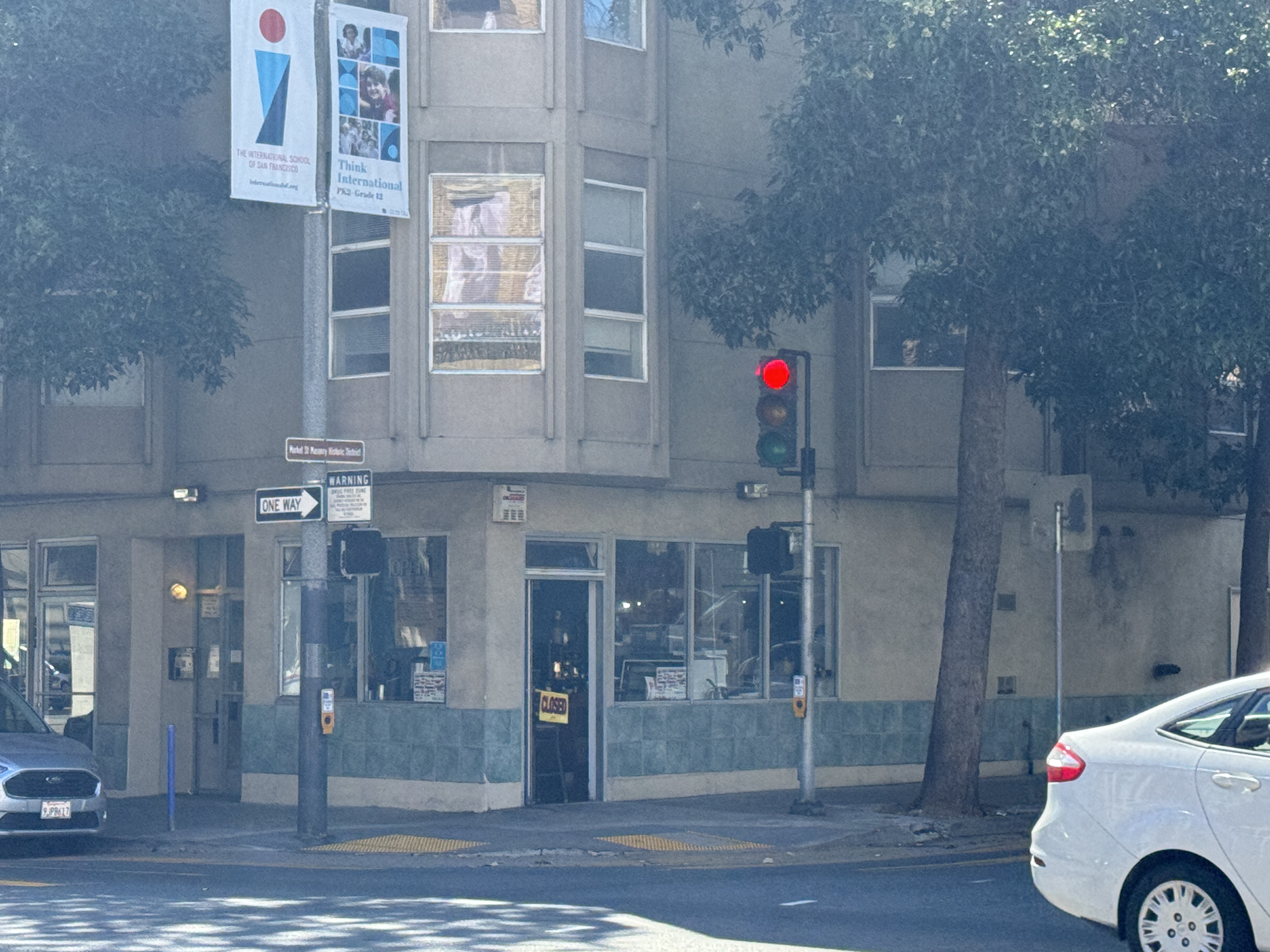 201 Fell Street San Francisco, CA 94102 - Photo 28 of 30 a car parked in front of a building
