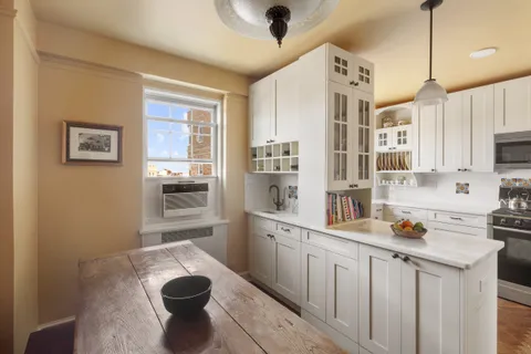 a open kitchen with stainless steel appliances granite countertop a sink stove and refrigerator