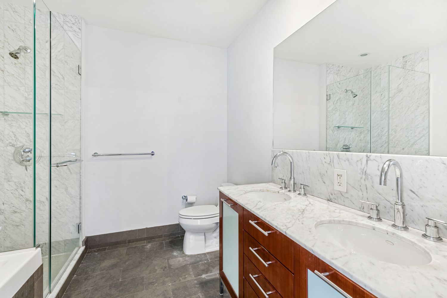 100 Jay Street, Unit 21J Brooklyn, NY 11201 - Photo 5 of 13 a bathroom with a sink toilet and shower