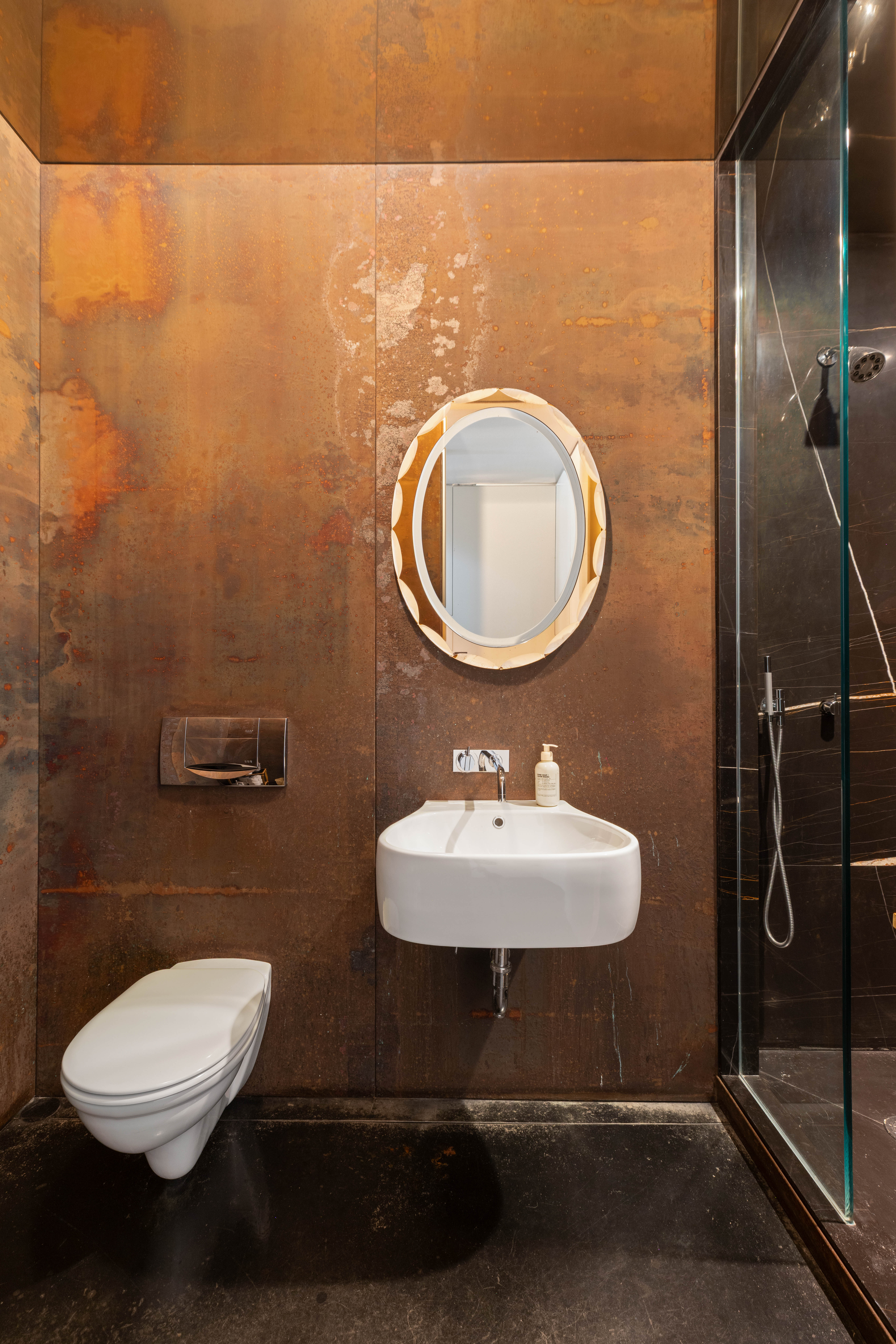 7 MacDougal Alley Manhattan, NY 10011 - Photo 11 of 25 a bathroom with a toilet a sink and mirror