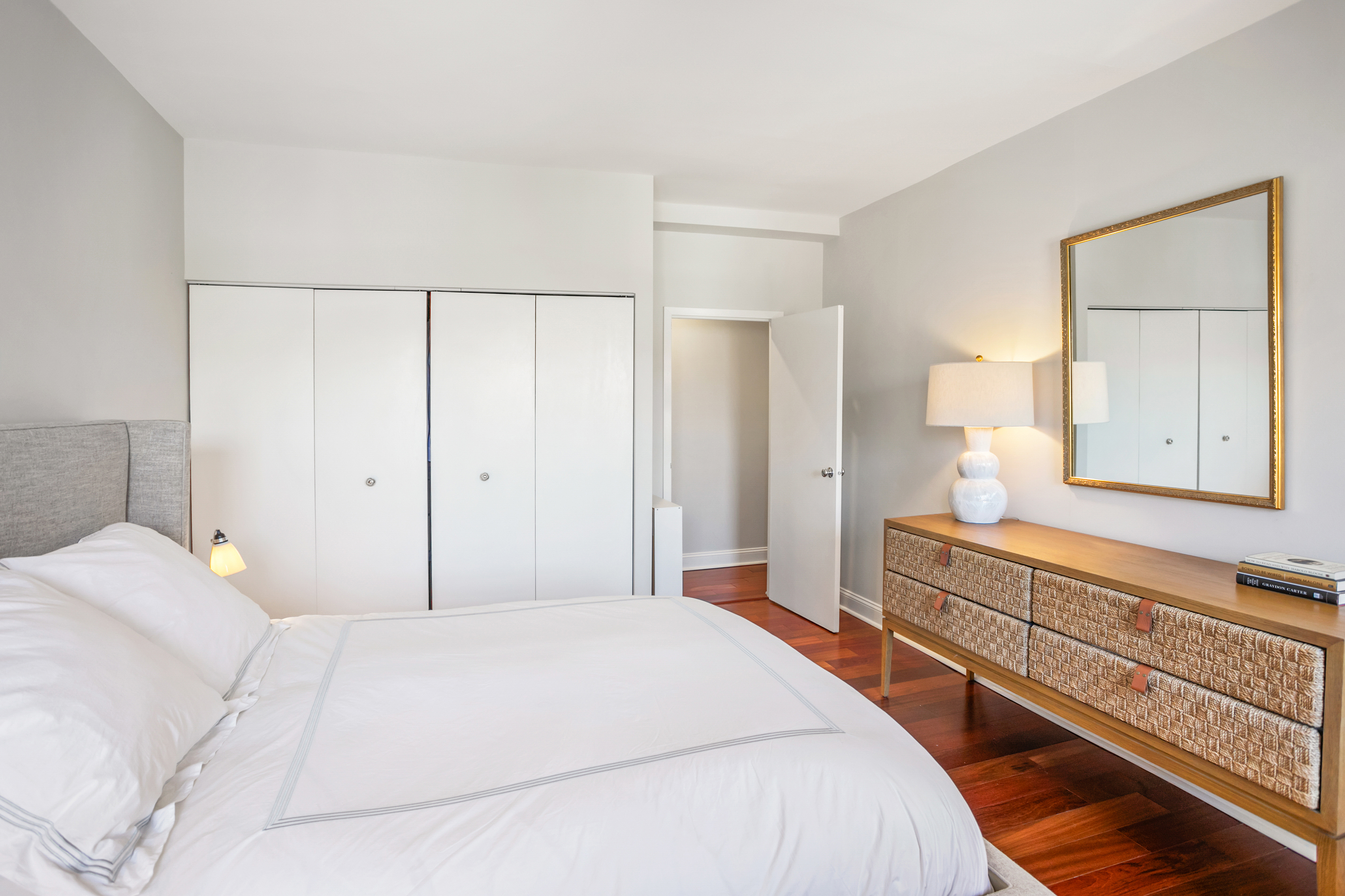 2123 California Street Northwest, Unit D5 Washington, DC 20008 - Photo 13 of 25 a bedroom with a bed and a large mirror
