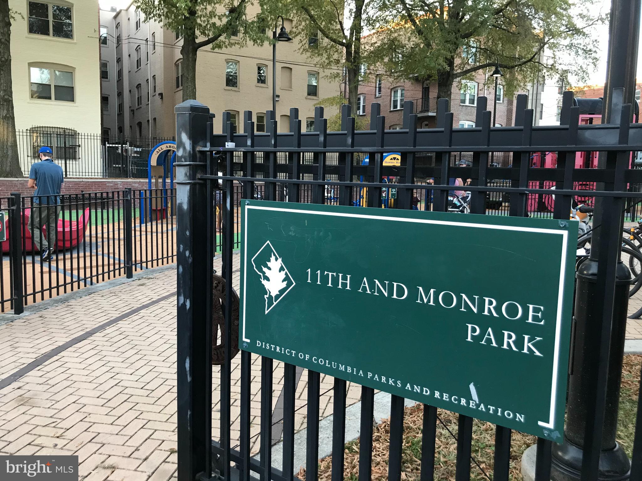 1033 Park Road Northwest, Unit 6 Washington, DC 20010 - Photo 33 of 38 a view of a sign board with a street
