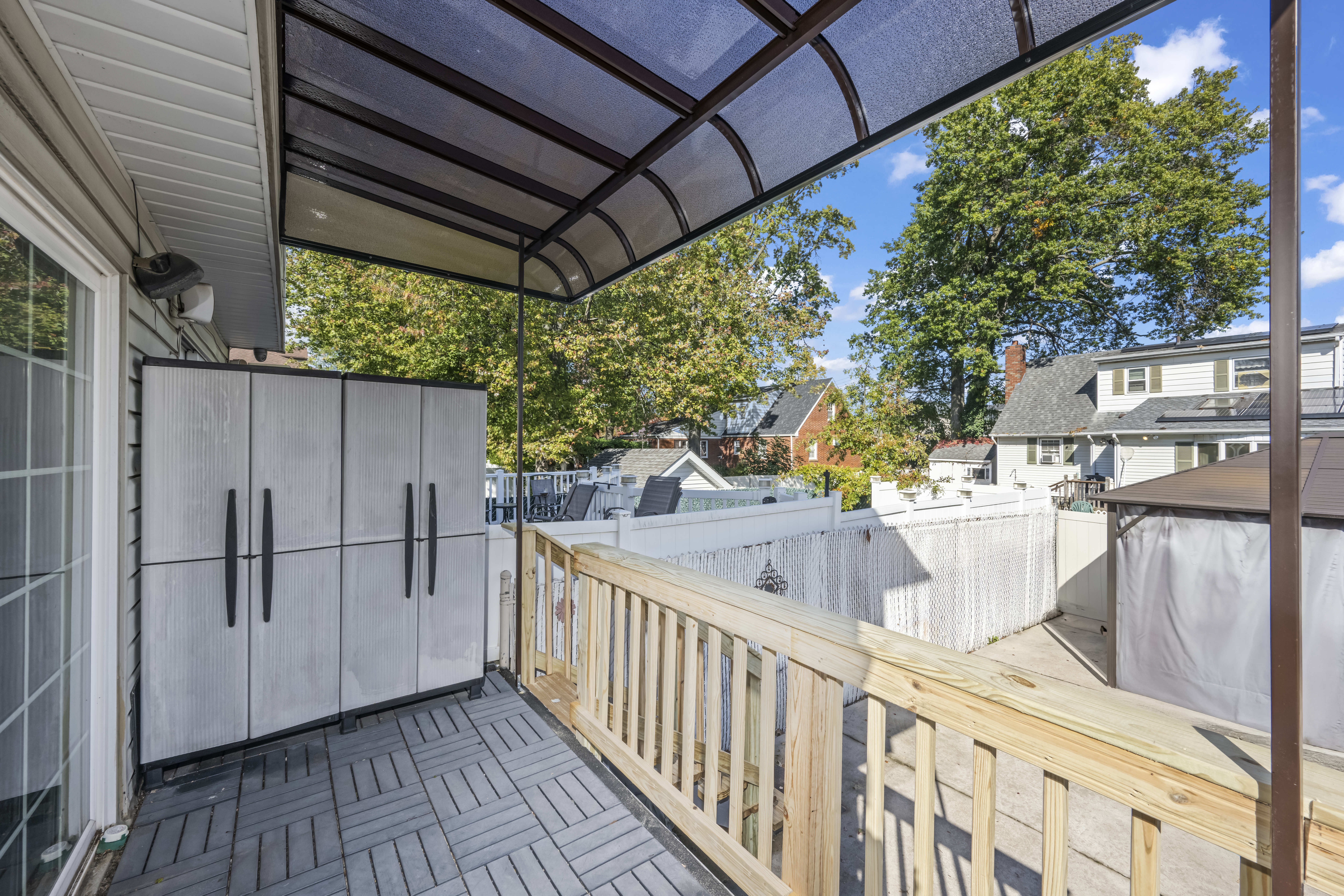 55 Sideview Avenue Staten Island, NY 10314 - Photo 20 of 28 a view of balcony with wooden floor and seating space