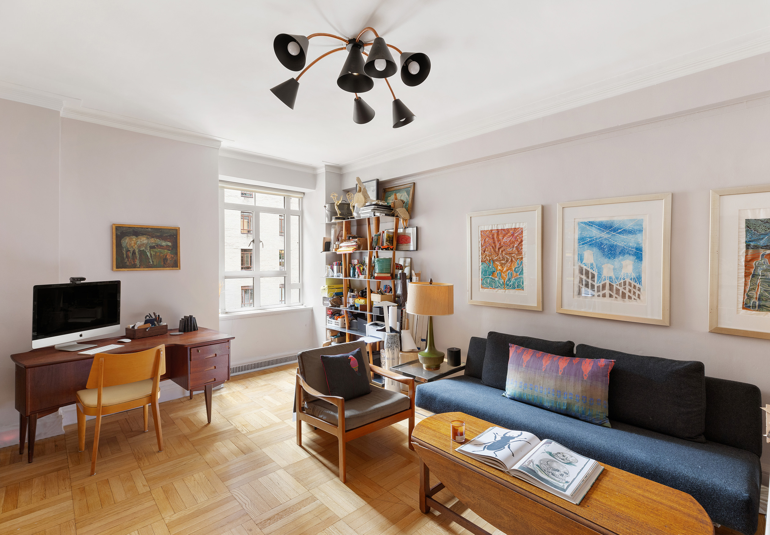 25 Central Park West, Unit 11C Manhattan, NY 10023 - Photo 9 of 17 a living room with furniture and a window
