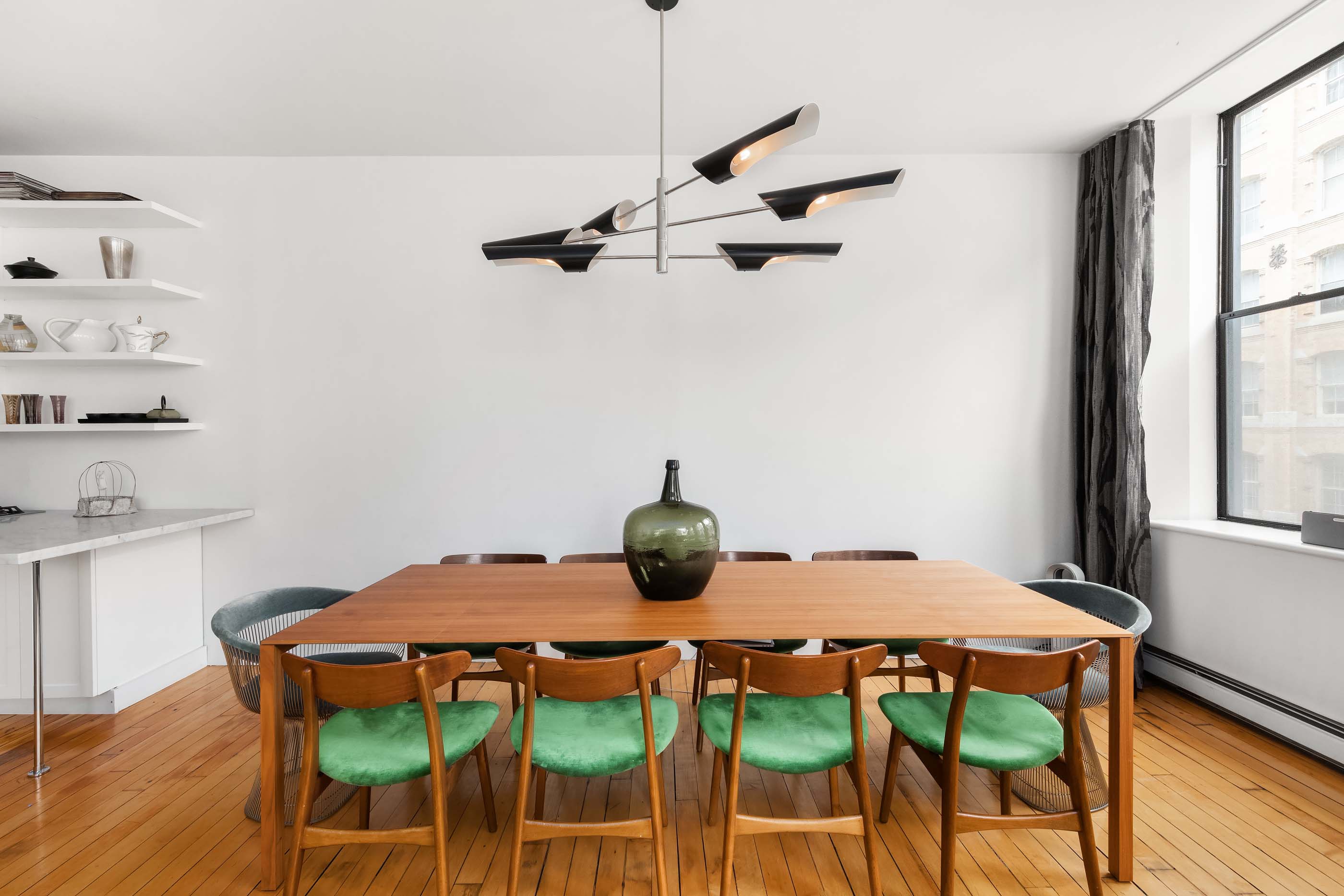 57 Laight Street, Unit 3 Manhattan, NY 10013 - Photo 5 of 15 a bedroom with a bed and wooden floor
