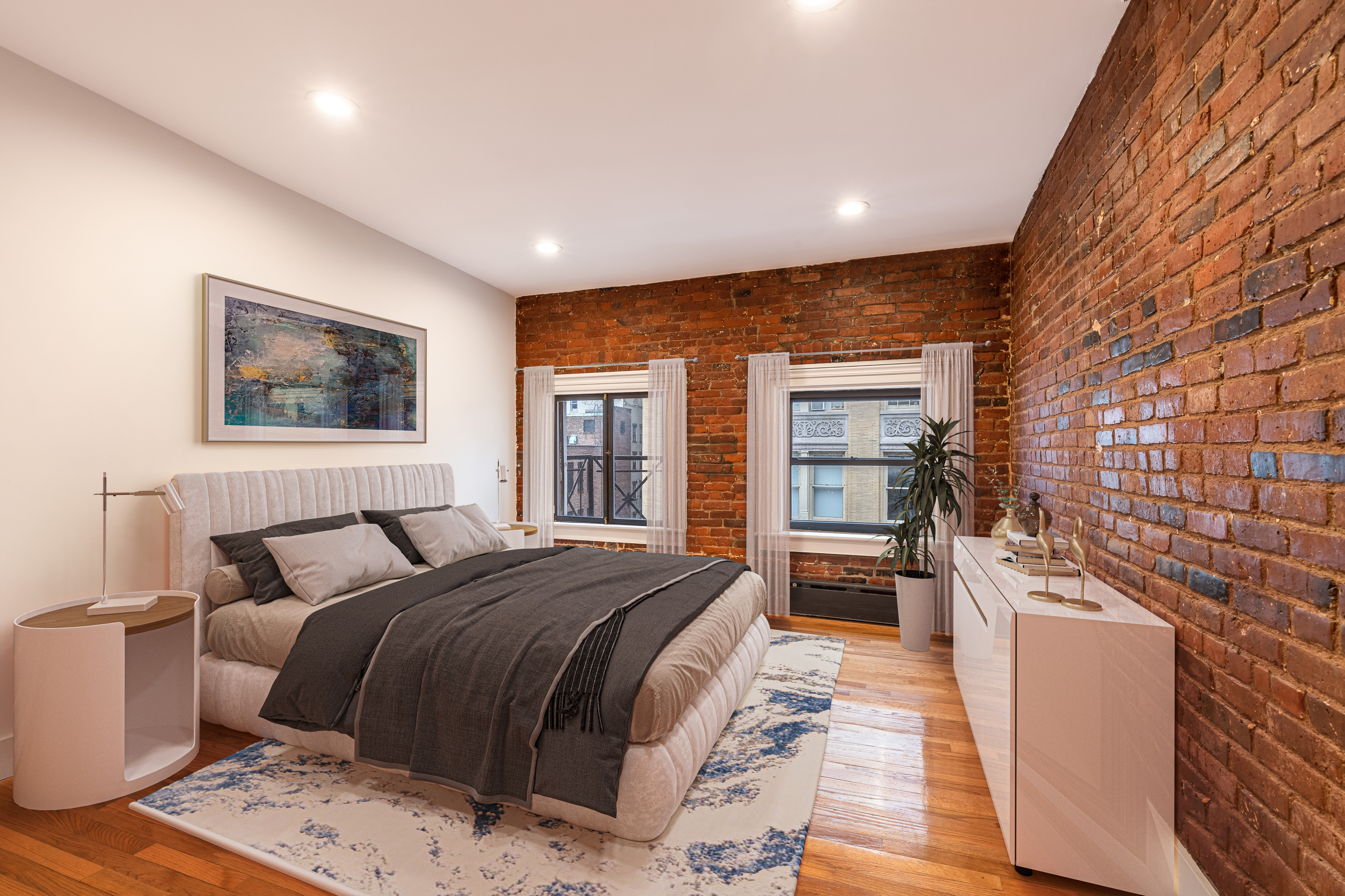 61 Lispenard Street, Unit 4 Manhattan, NY 10013 - Photo 4 of 8 a bed room with a bed and a refrigerator