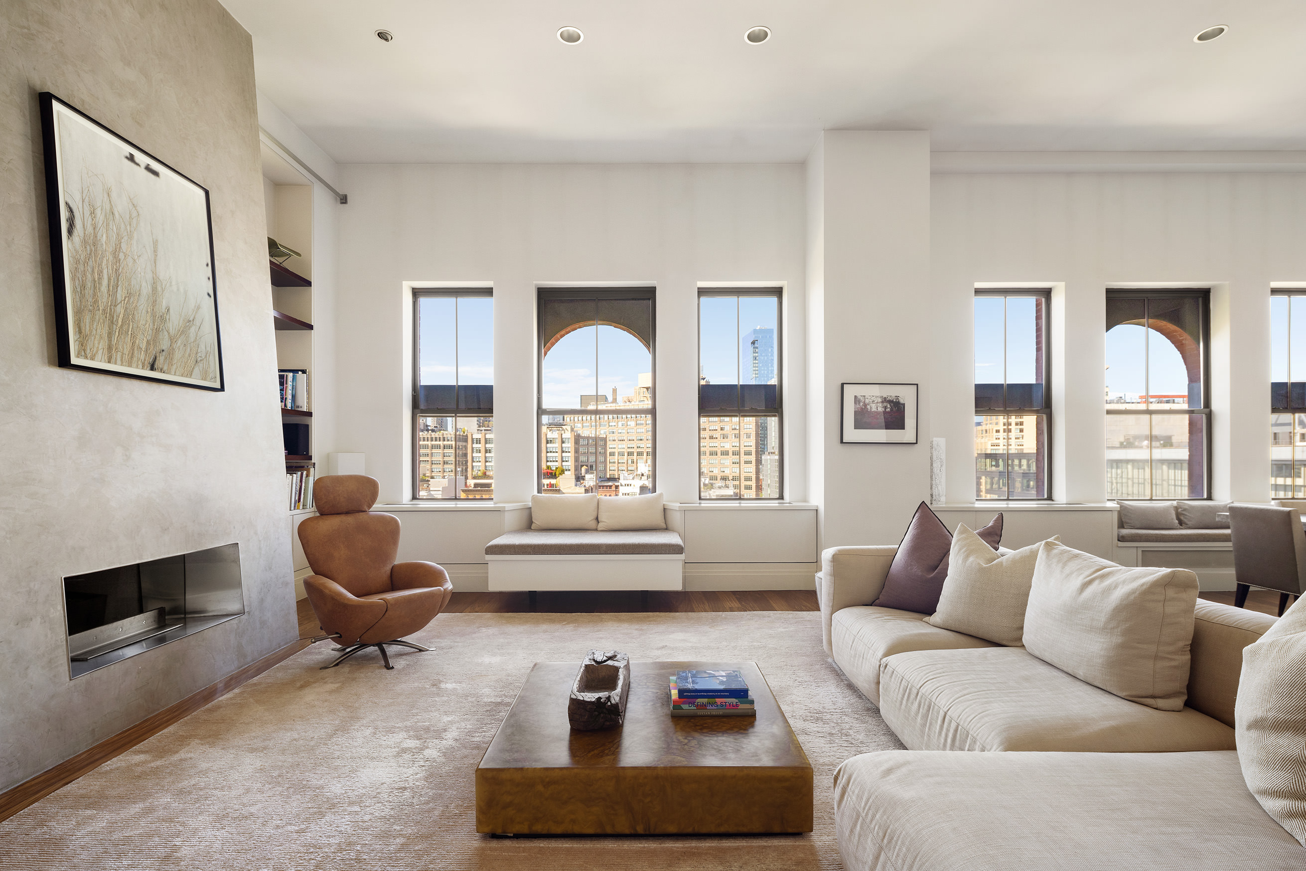 27 North Moore Street, Unit 10D Manhattan, NY 10013 - Photo 3 of 30 a living room with furniture fireplace and a large window