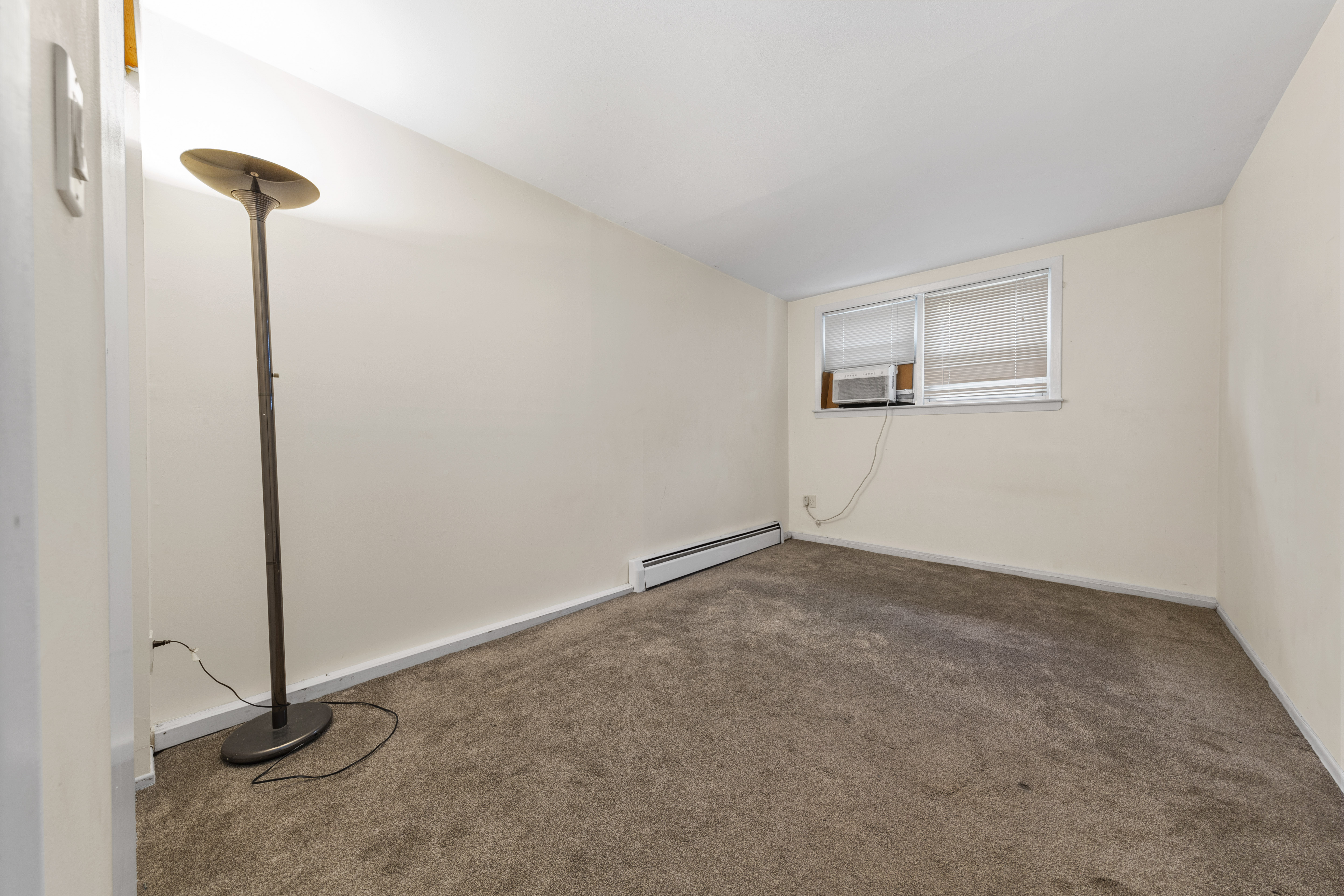 240-47 68th Avenue Queens, NY 11362 - Photo 23 of 39 a view of an empty room