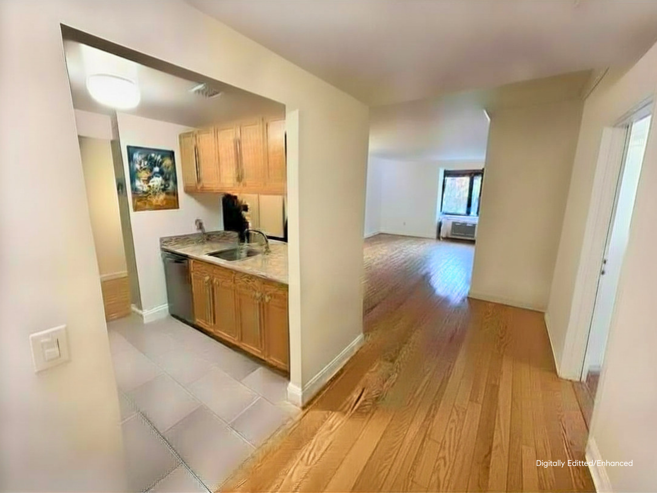 380 Lenox Avenue, Unit 3J Manhattan, NY 10027 - Photo 3 of 9 a view of a kitchen from the hallway