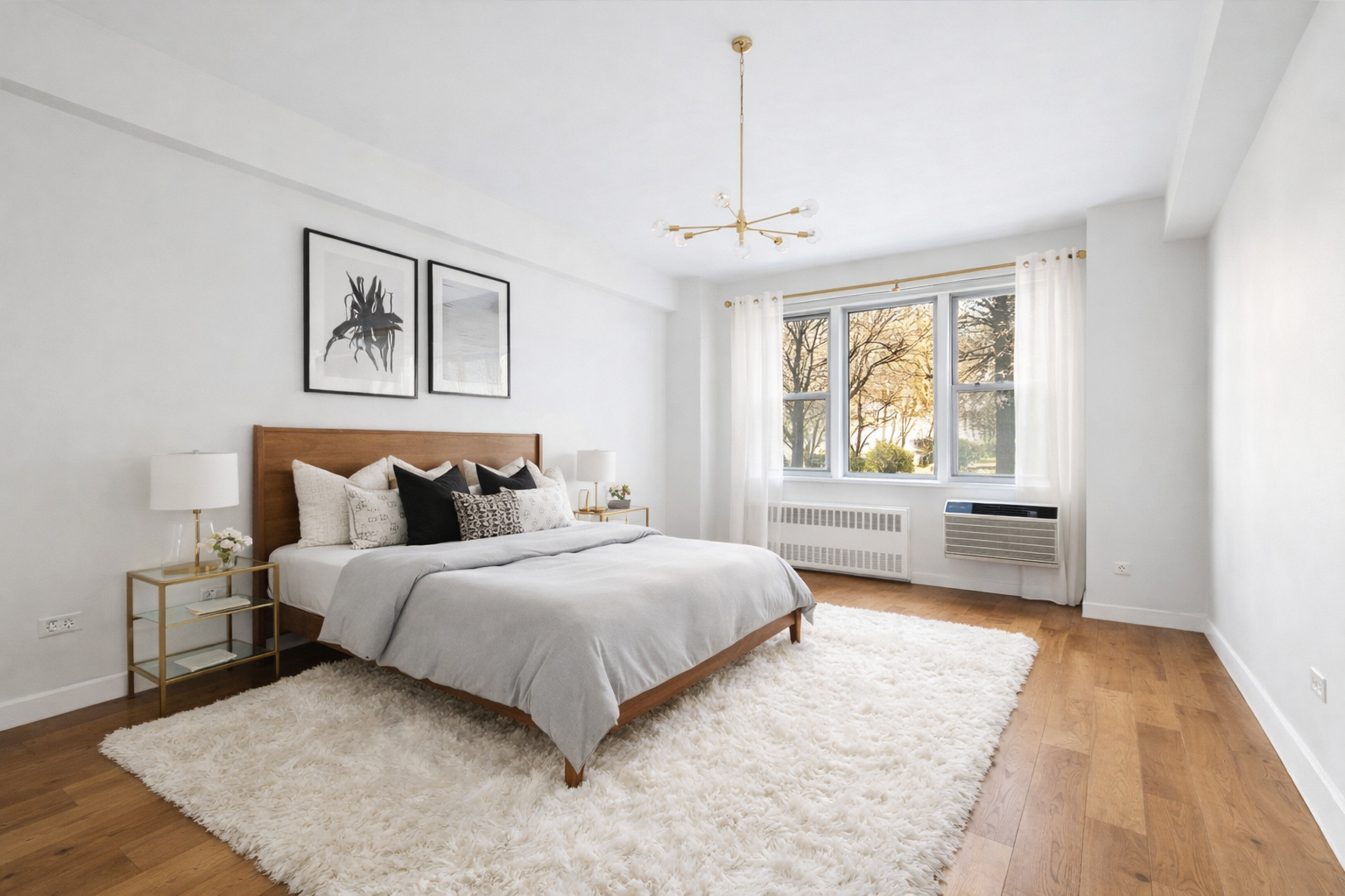 3755 Henry Hudson Parkway West, Unit 3F Bronx, NY 10463 - Photo 7 of 17 a spacious bedroom with a bed and a window