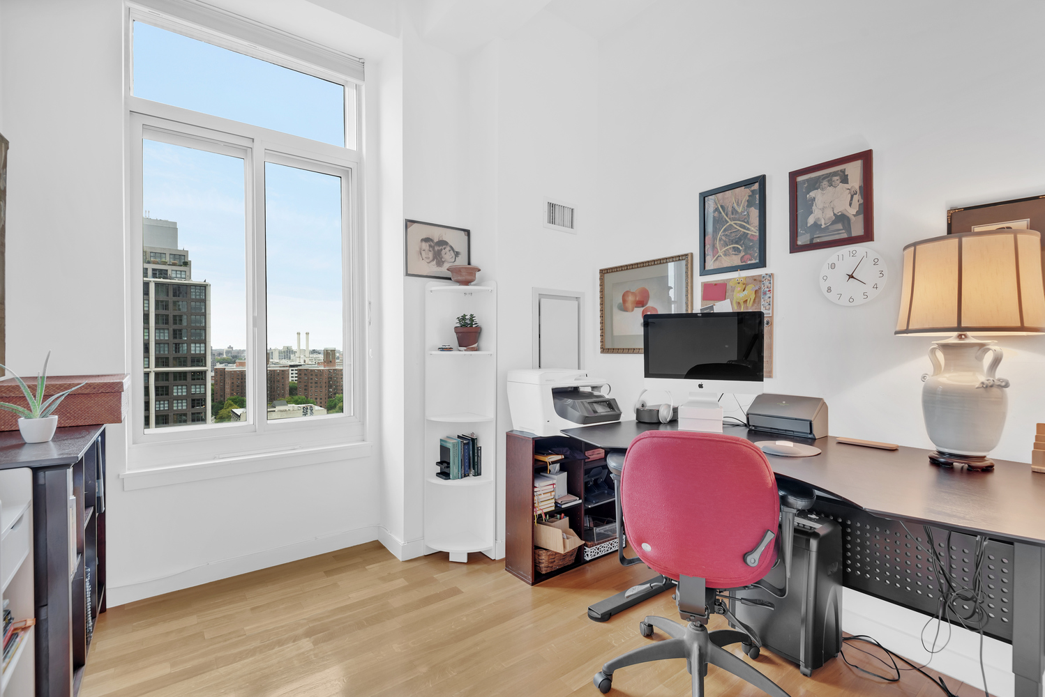 85 Adams Street, Unit 15D Brooklyn, NY 11201 - Photo 2 of 8 a livingroom with workspace and a window