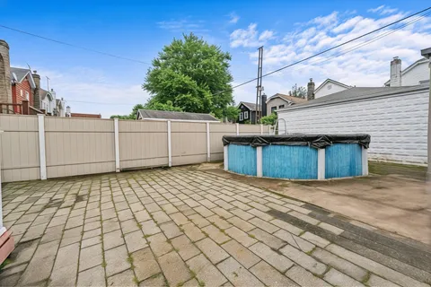 a view of a backyard of the house