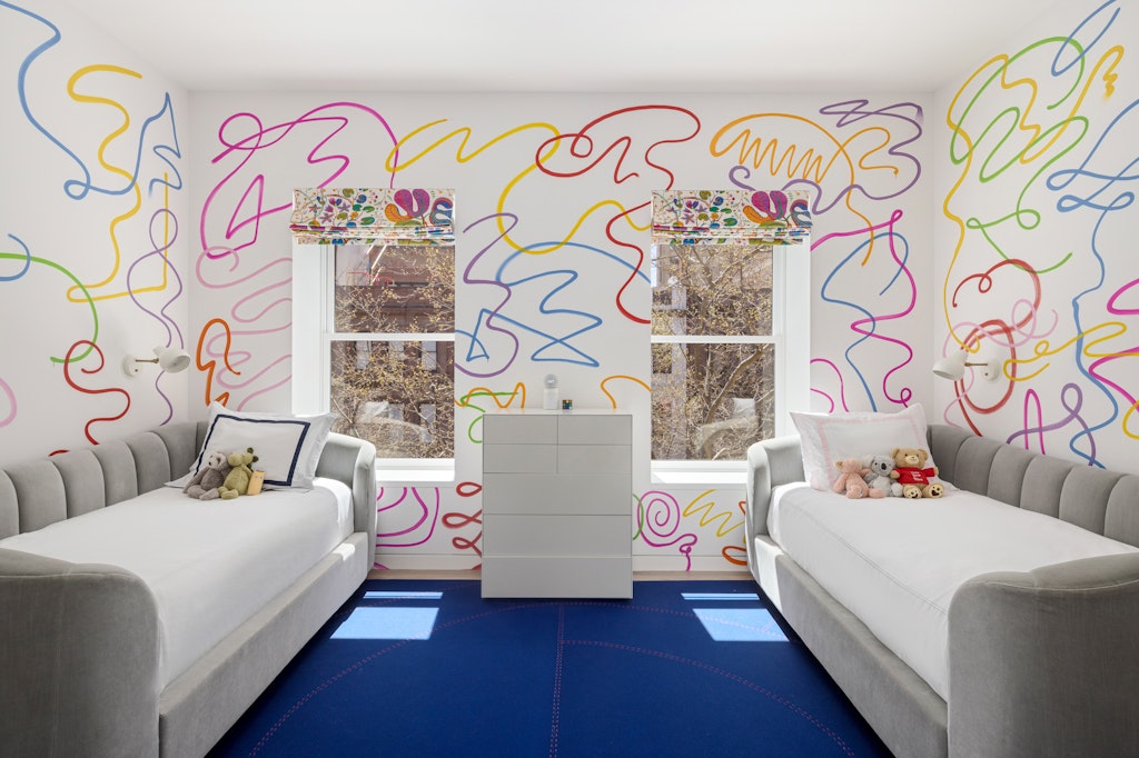 125 West 87th Street Manhattan, NY 10024 - Photo 15 of 27 a living room with a couch and a table with wooden floor