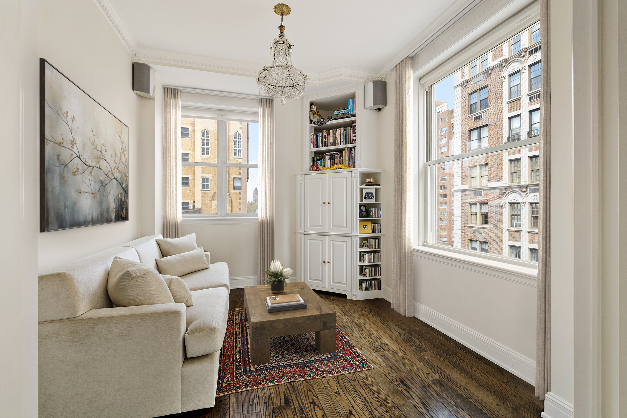 876 Park Avenue, Unit 9N Manhattan, NY 10075 - Photo 12 of 18 a living room with furniture and a window